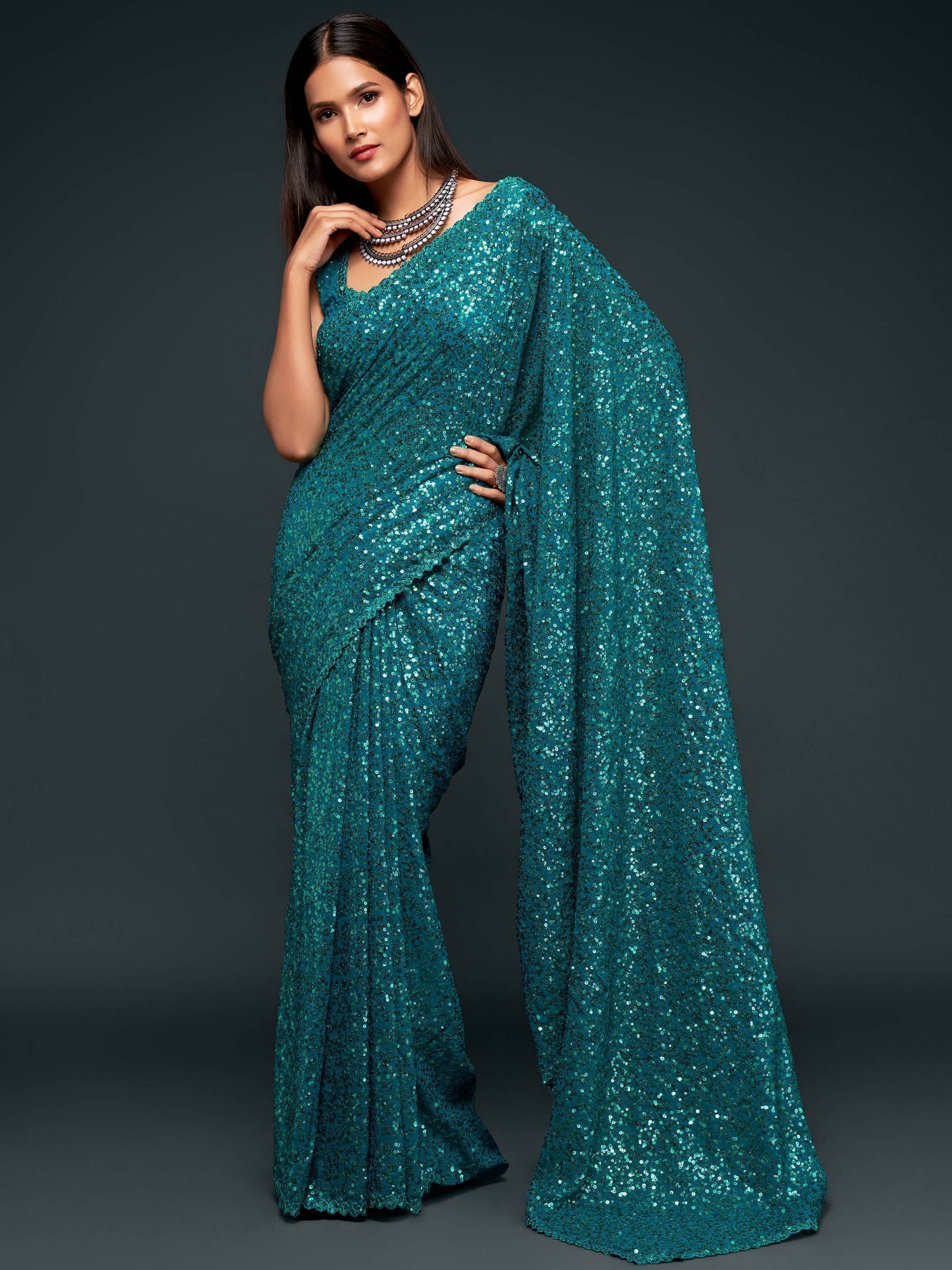 Stunning Teal Blue Sequins Georgette Reception Wear Saree