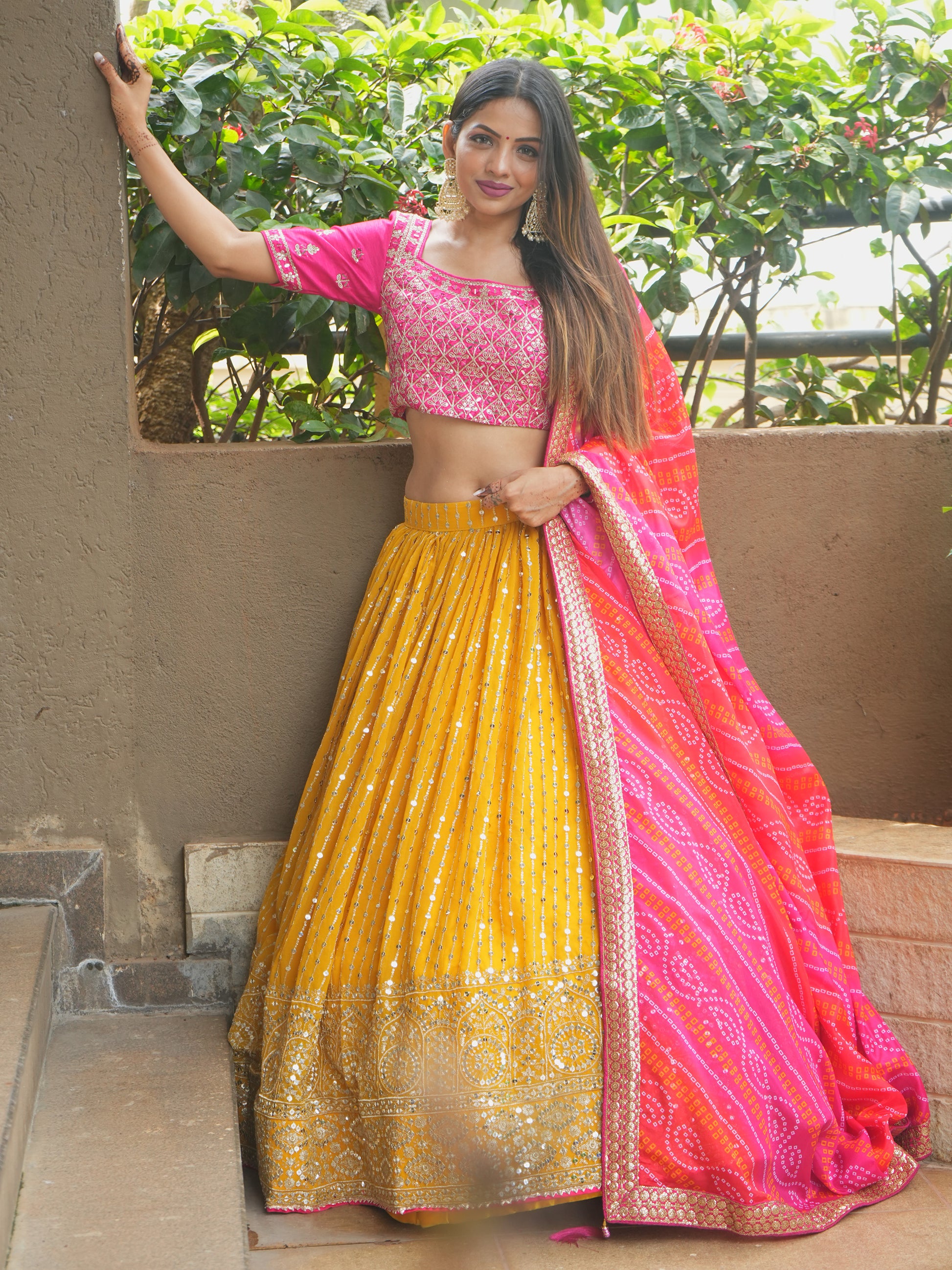 Glamorous Yellow Sequins Georgette Haldi Wear Lehenga Choli