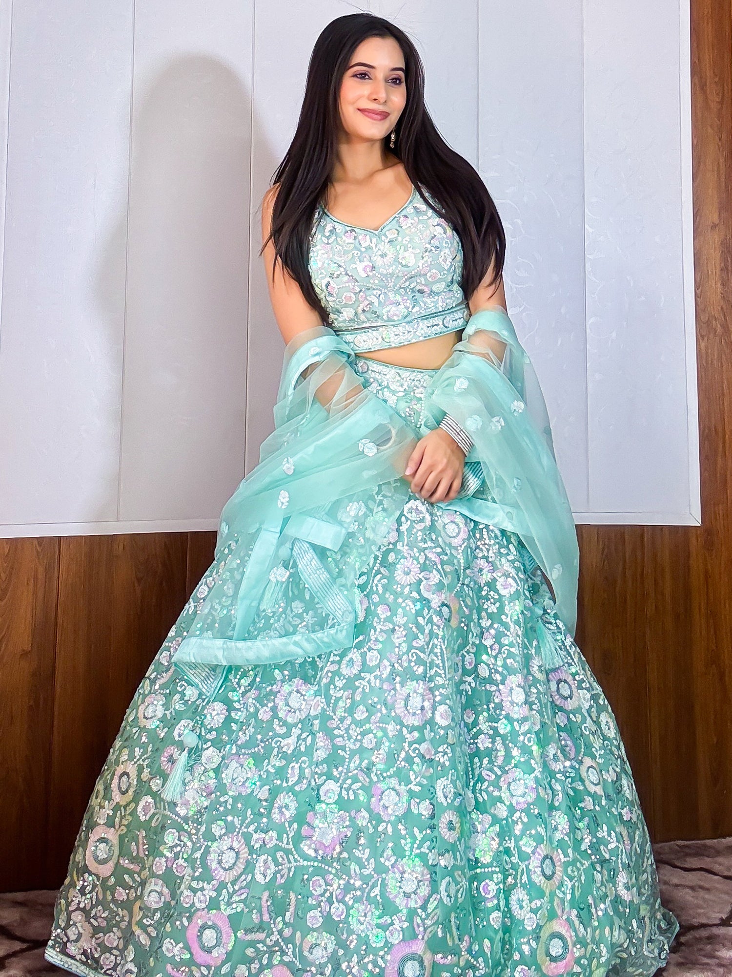 Mesmerizing Blue Sequins Net Party Wear Lehenga Choli With Dupatta