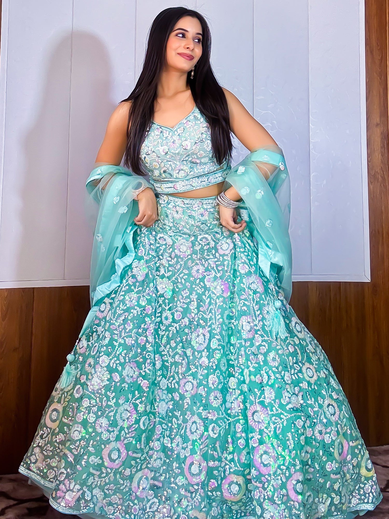 Mesmerizing Blue Sequins Net Party Wear Lehenga Choli With Dupatta