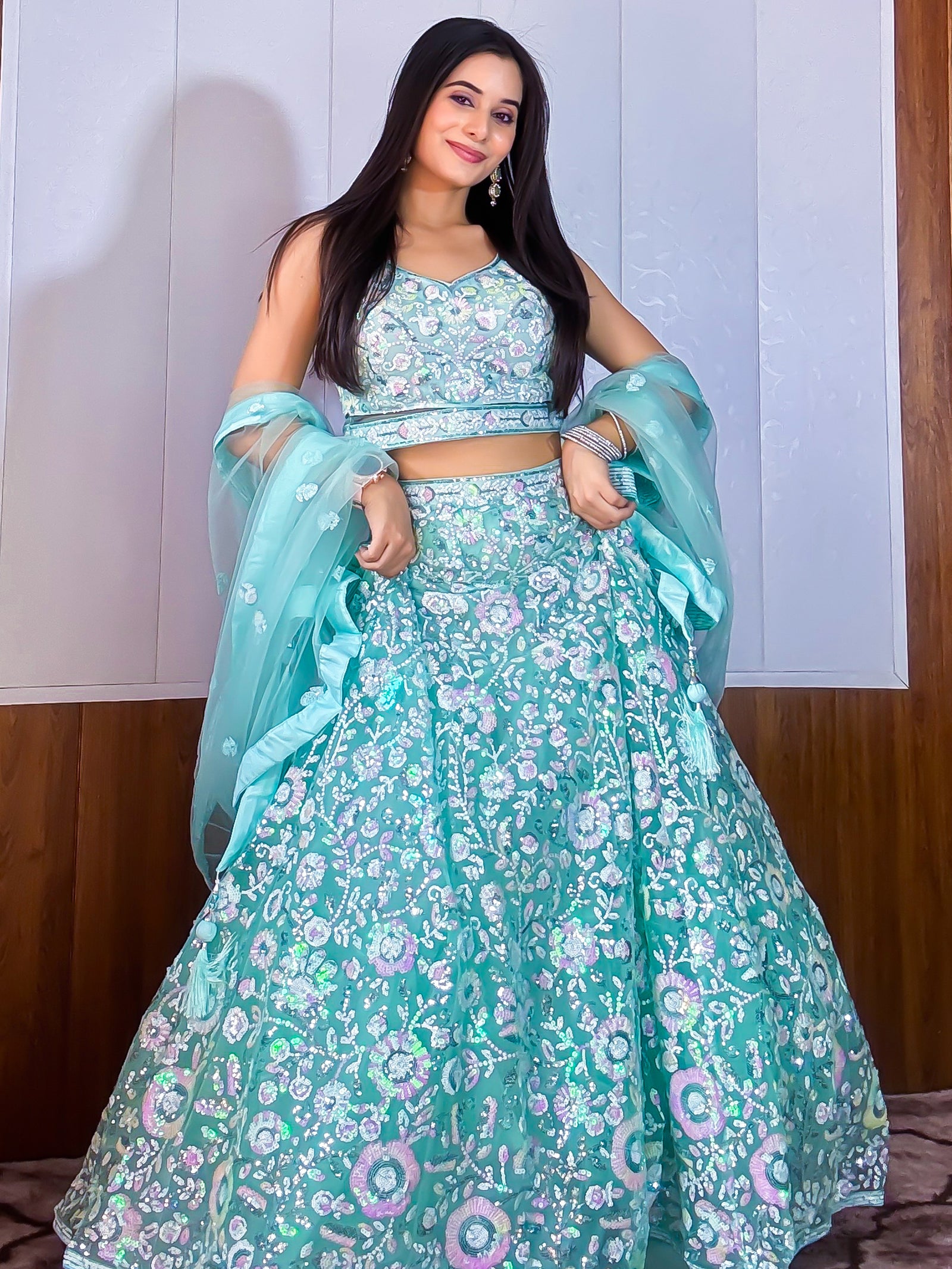 Mesmerizing Blue Sequins Net Party Wear Lehenga Choli With Dupatta