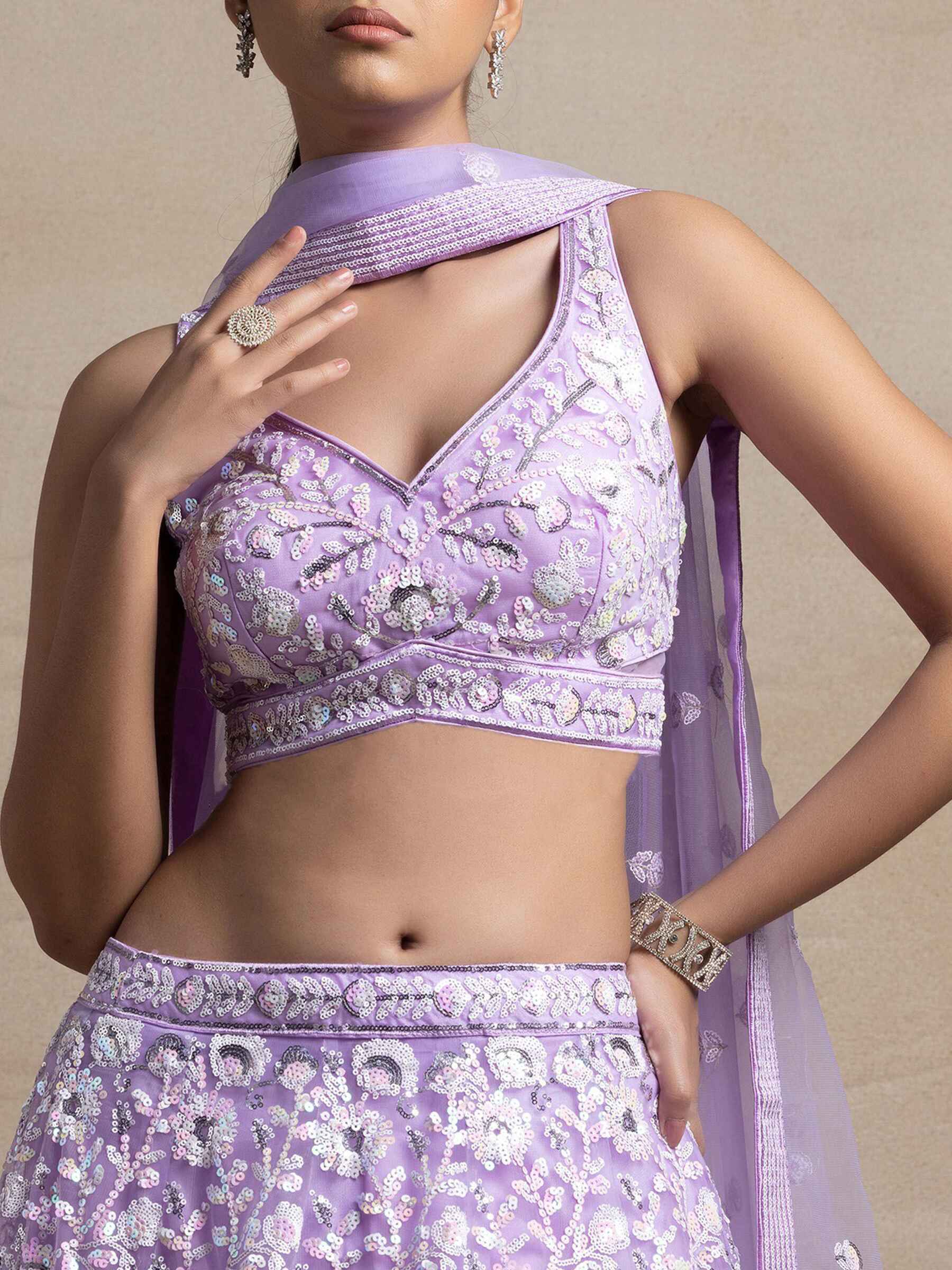 Surprising Lavender Sequins Net Reception Wear Lehenga Choli