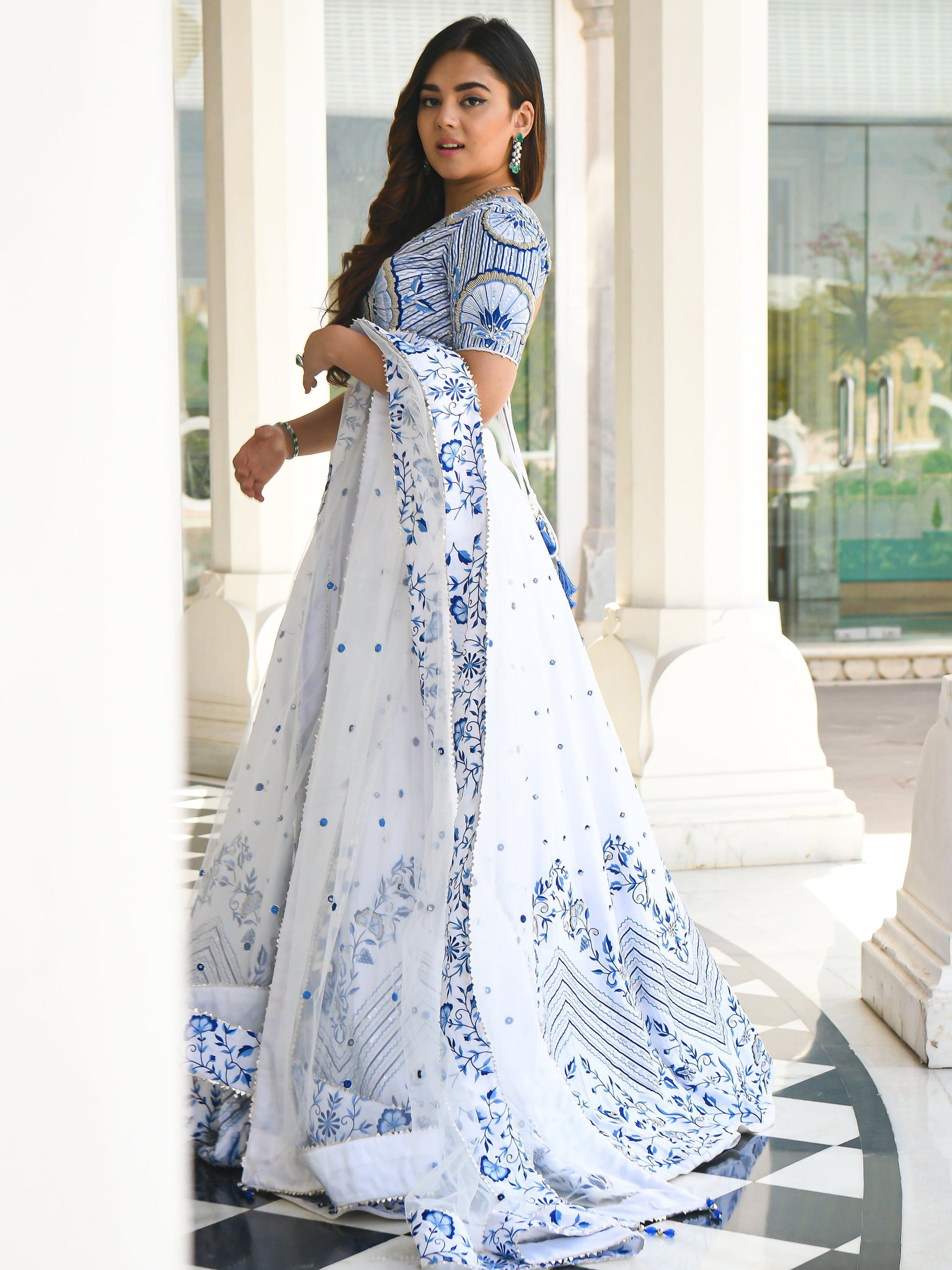 Lovely White Thread Work Sangeet Wear Lehenga Choli With Net Dupatta