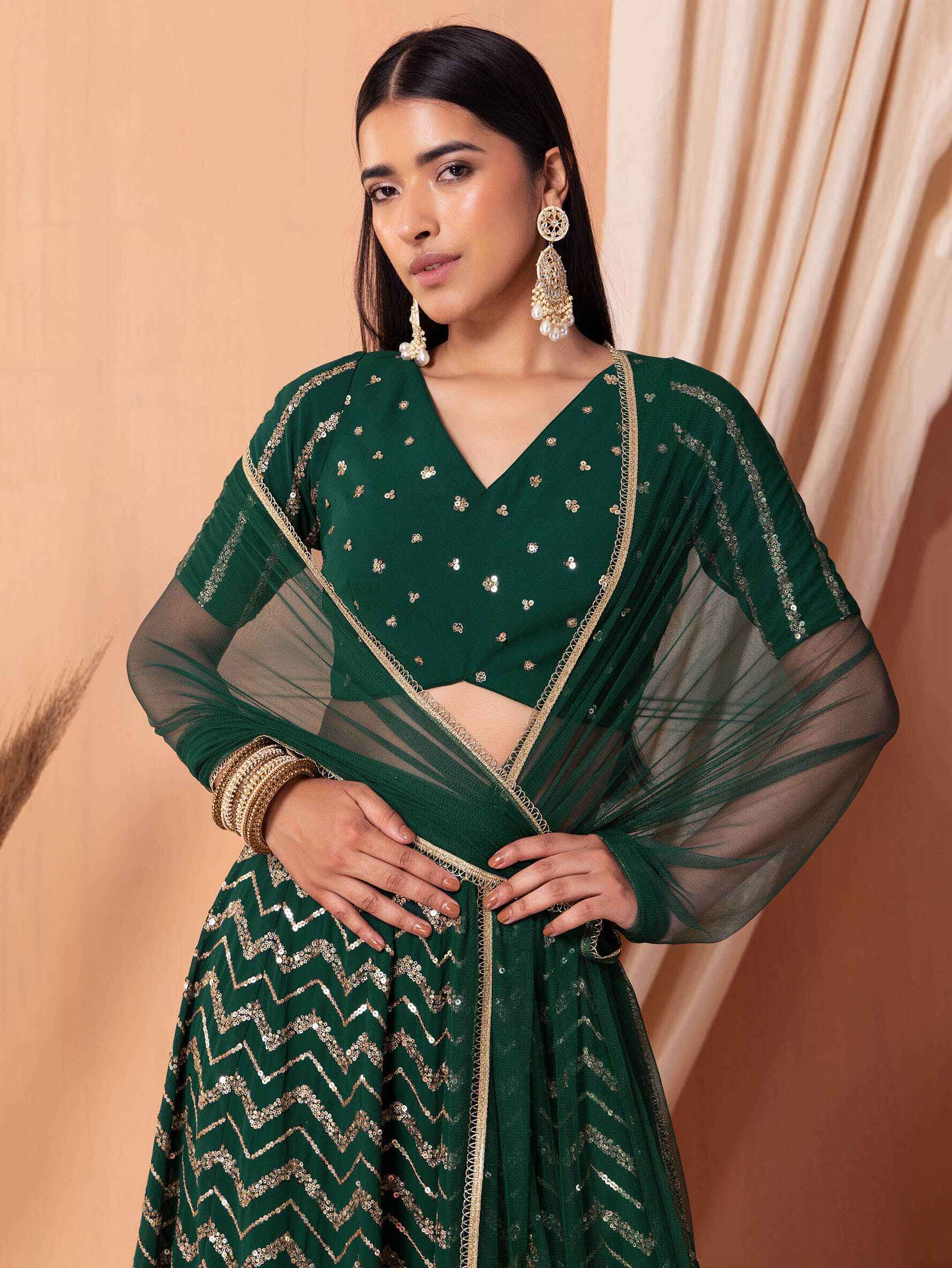 Alluring Green Embroidered Georgette Mehendi Wear Lehenga Choli