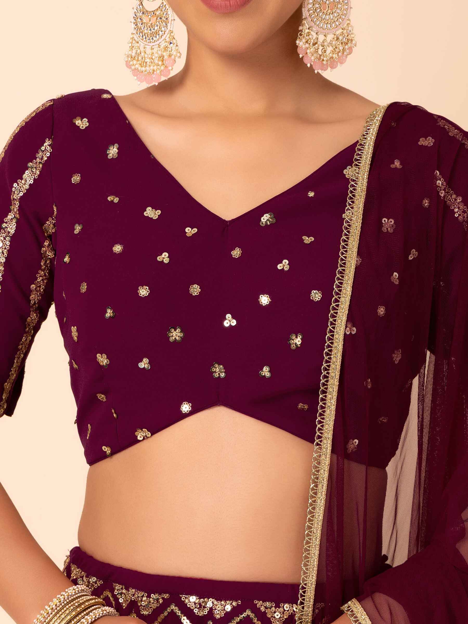 Delightful Maroon Zari Embroidered Georgette Wedding Lehenga Choli
