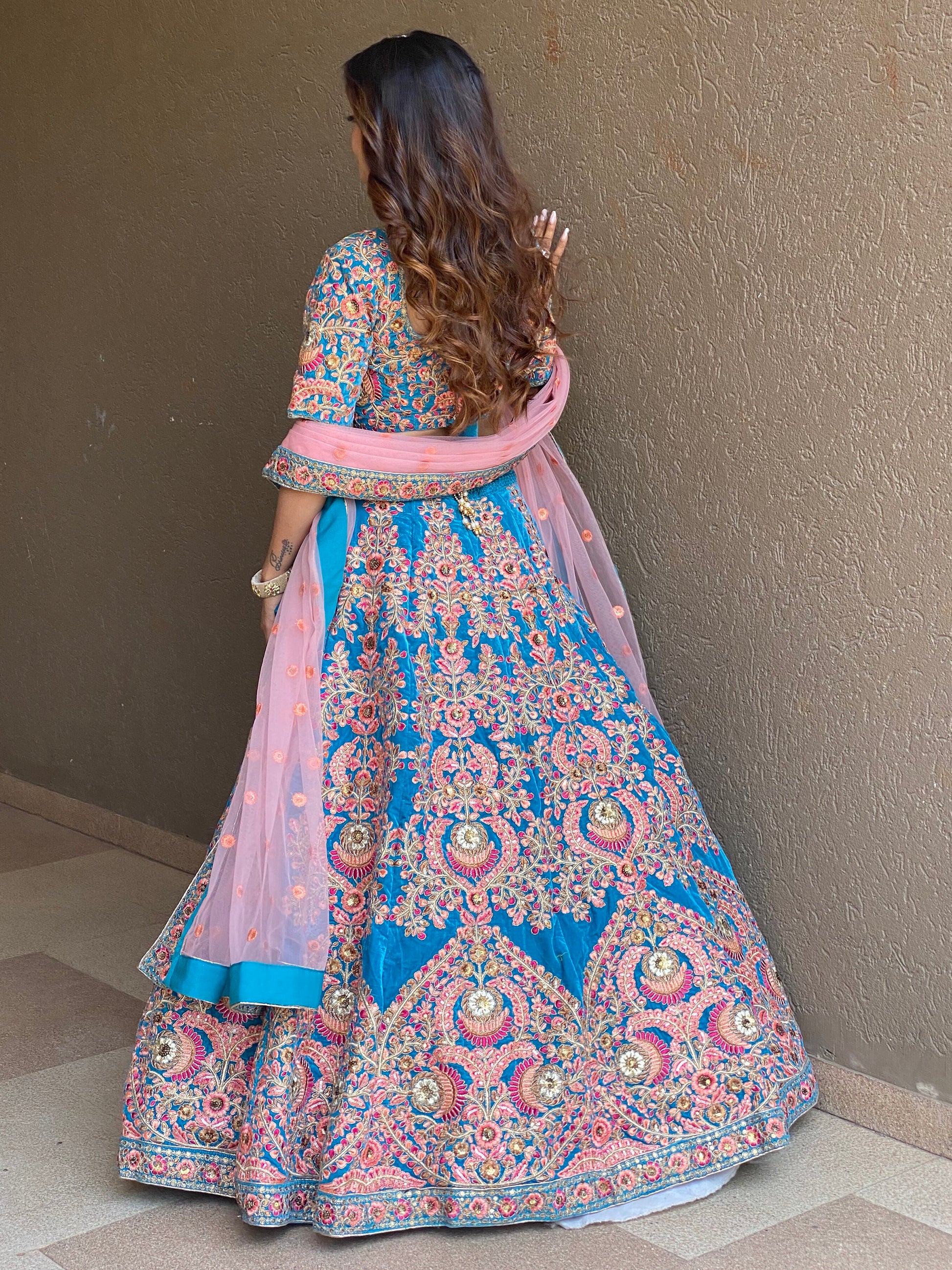 Attractive Blue Embroidered Velvet Wedding Wear Lehenga Choli