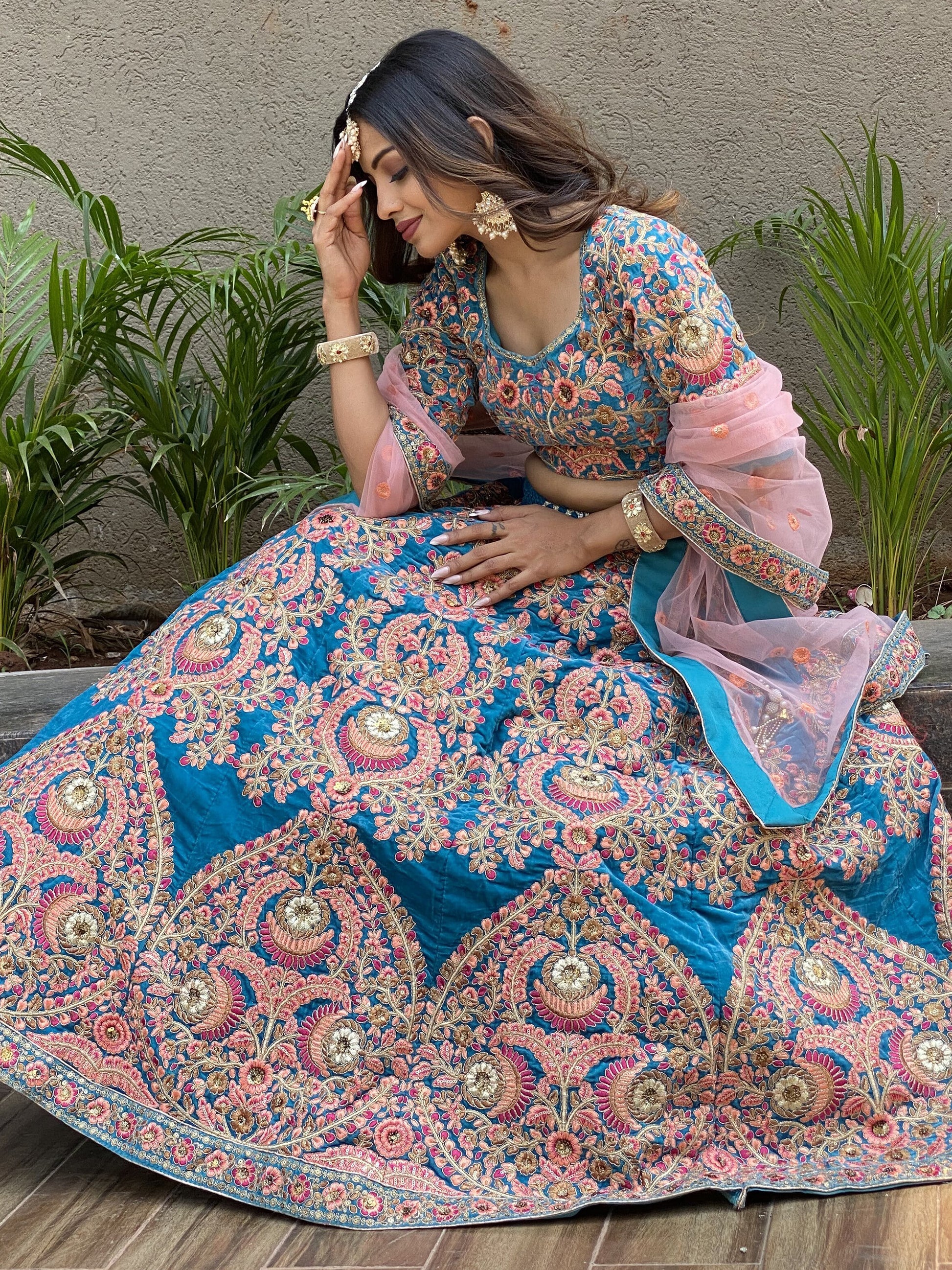 Attractive Blue Embroidered Velvet Wedding Wear Lehenga Choli