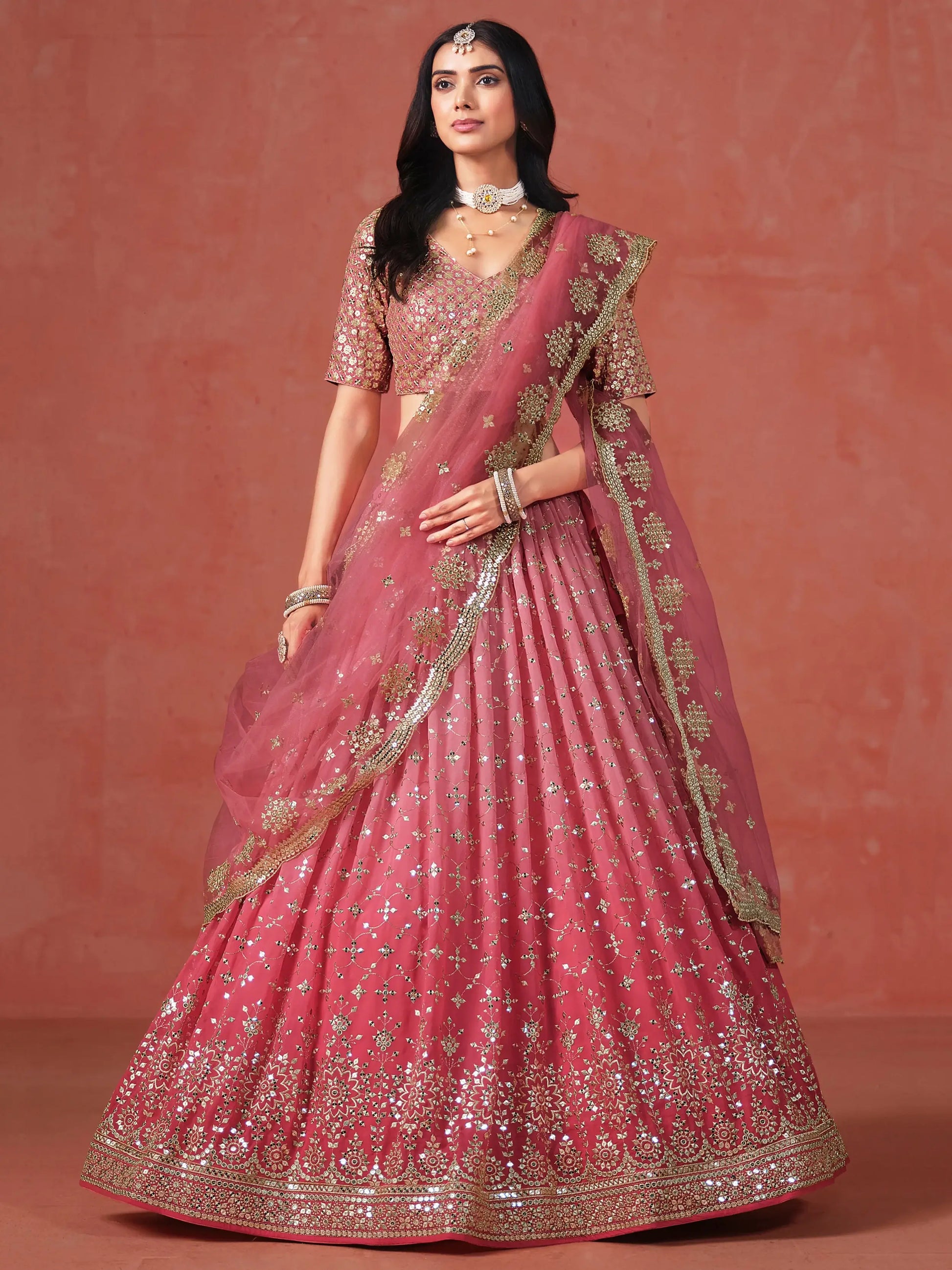 Fabulous Peach Georgette Embroidered Zari Lehenga Choli With Dupatta - Zeel Clothing