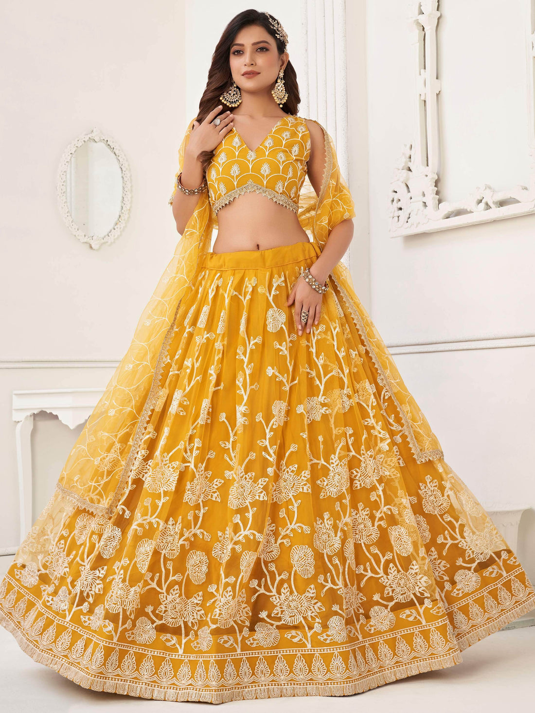 Fascinating Yellow Embroidered Net Haldi Wear Lehenga Choli - Zeel Clothing