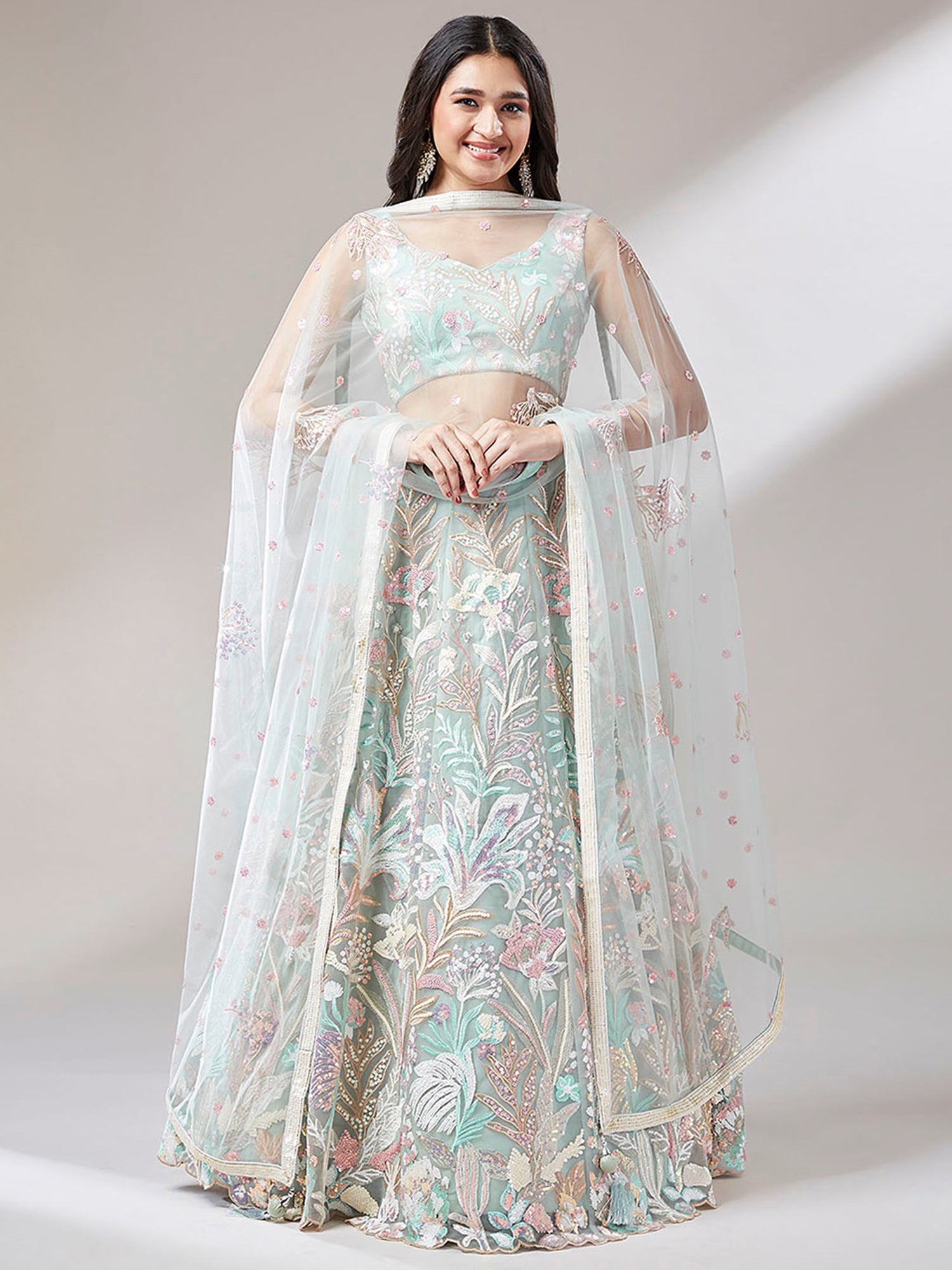 Astonishing Pista Green Sequins Net Wedding Wear Lehenga Choli