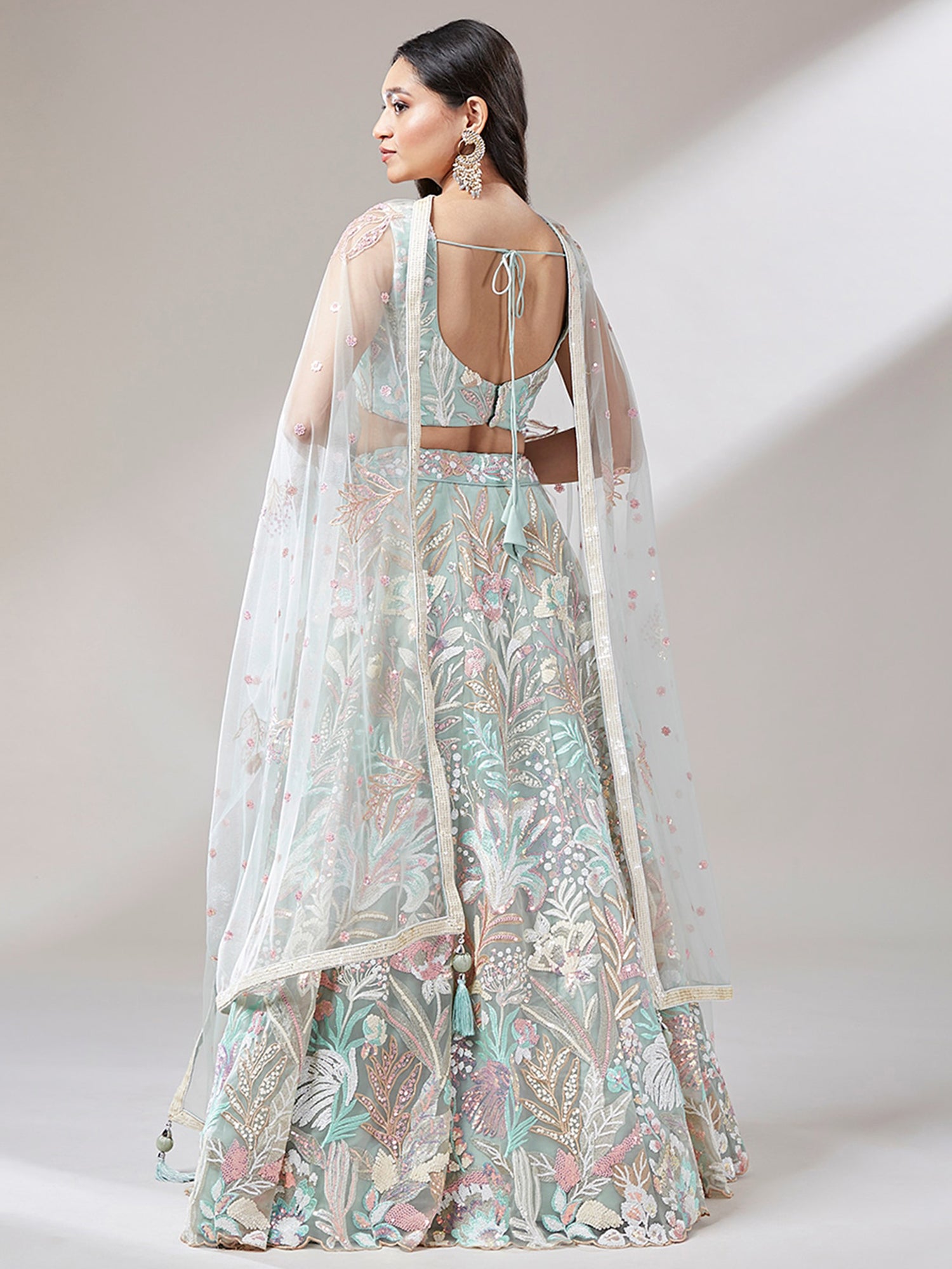 Astonishing Pista Green Sequins Net Wedding Wear Lehenga Choli