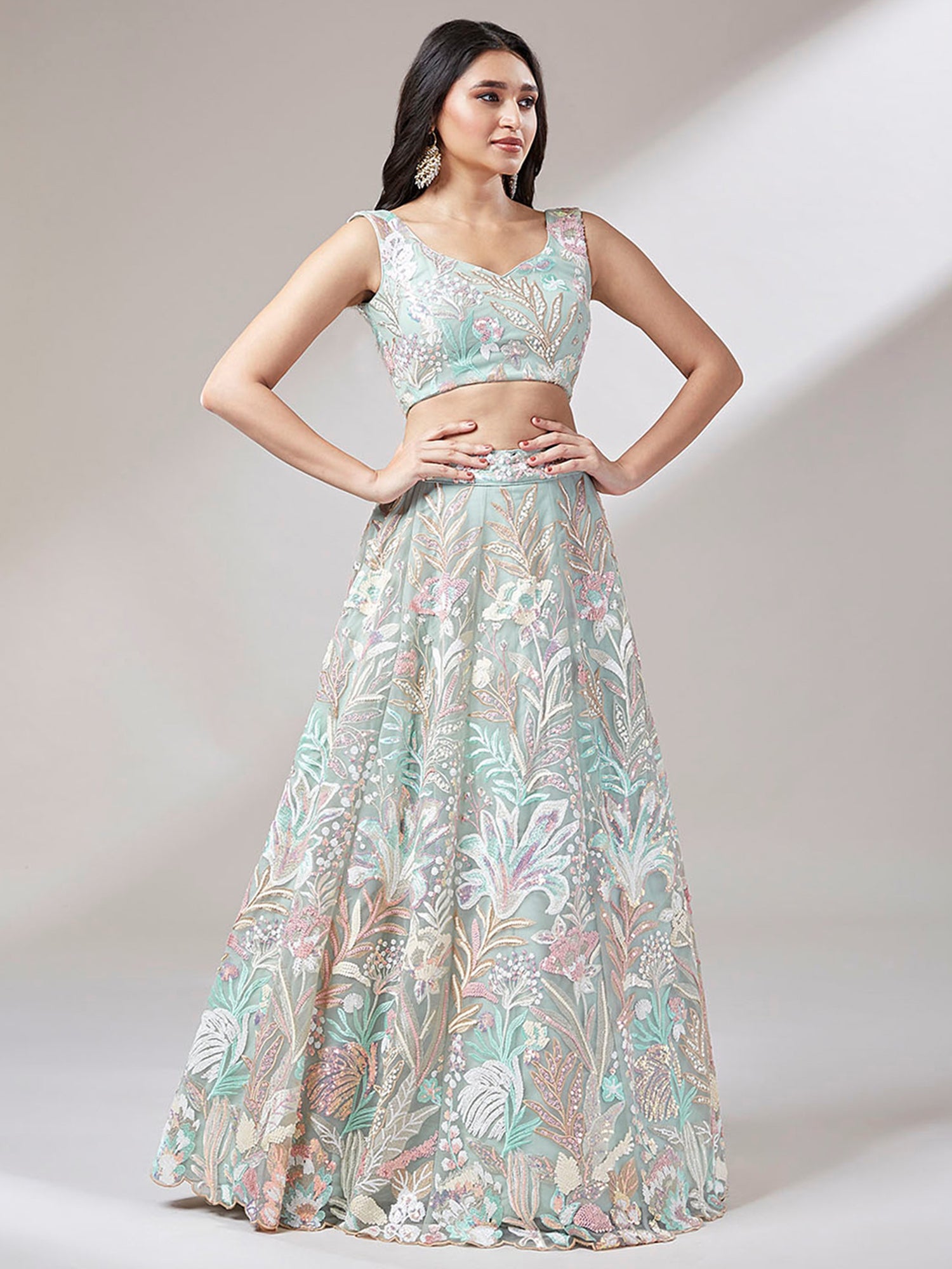 Astonishing Pista Green Sequins Net Wedding Wear Lehenga Choli