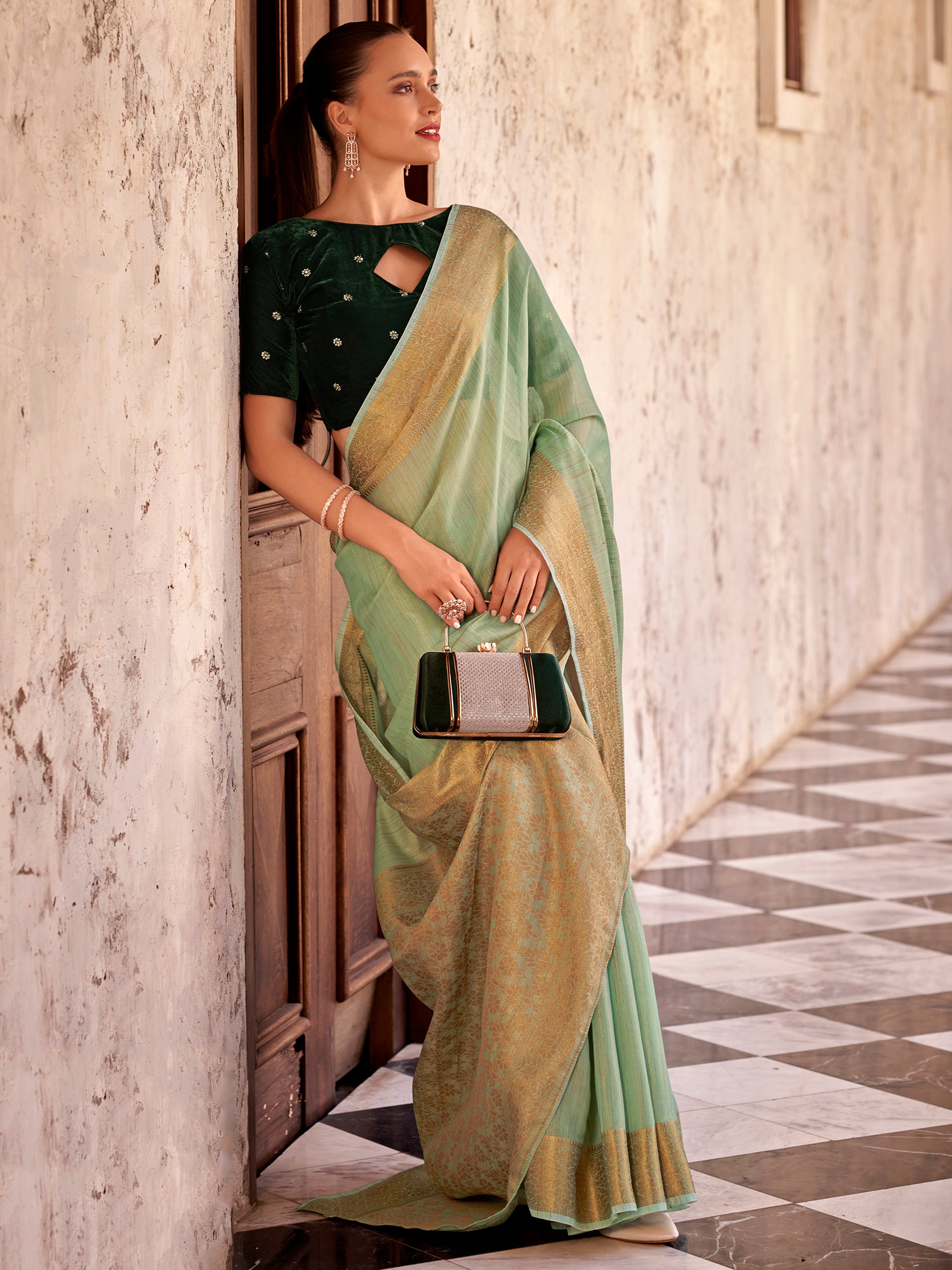 Tantalizing Pista Green Zari Weaving Tissue Silk Saree With Blouse