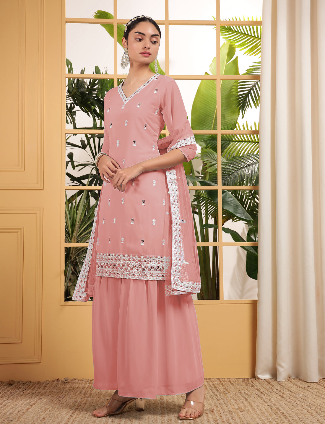 Alluring Peach Sequins Georgette Festive Wear Sharara Suit With Dupatta