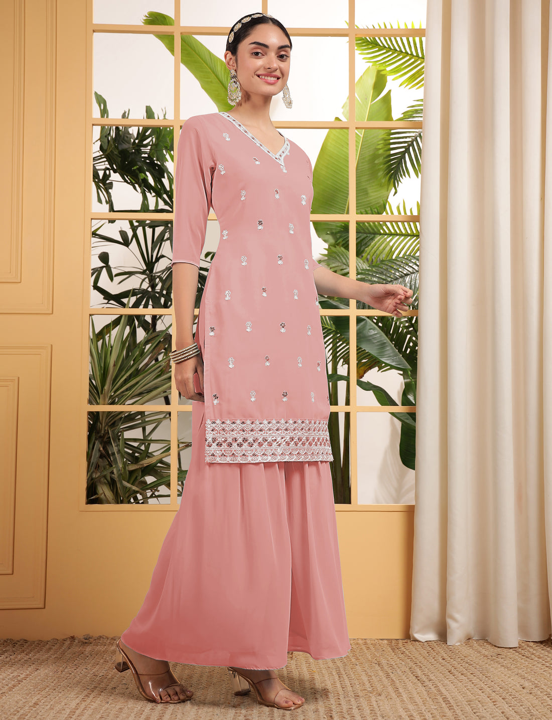 Alluring Peach Sequins Georgette Festive Wear Sharara Suit With Dupatta