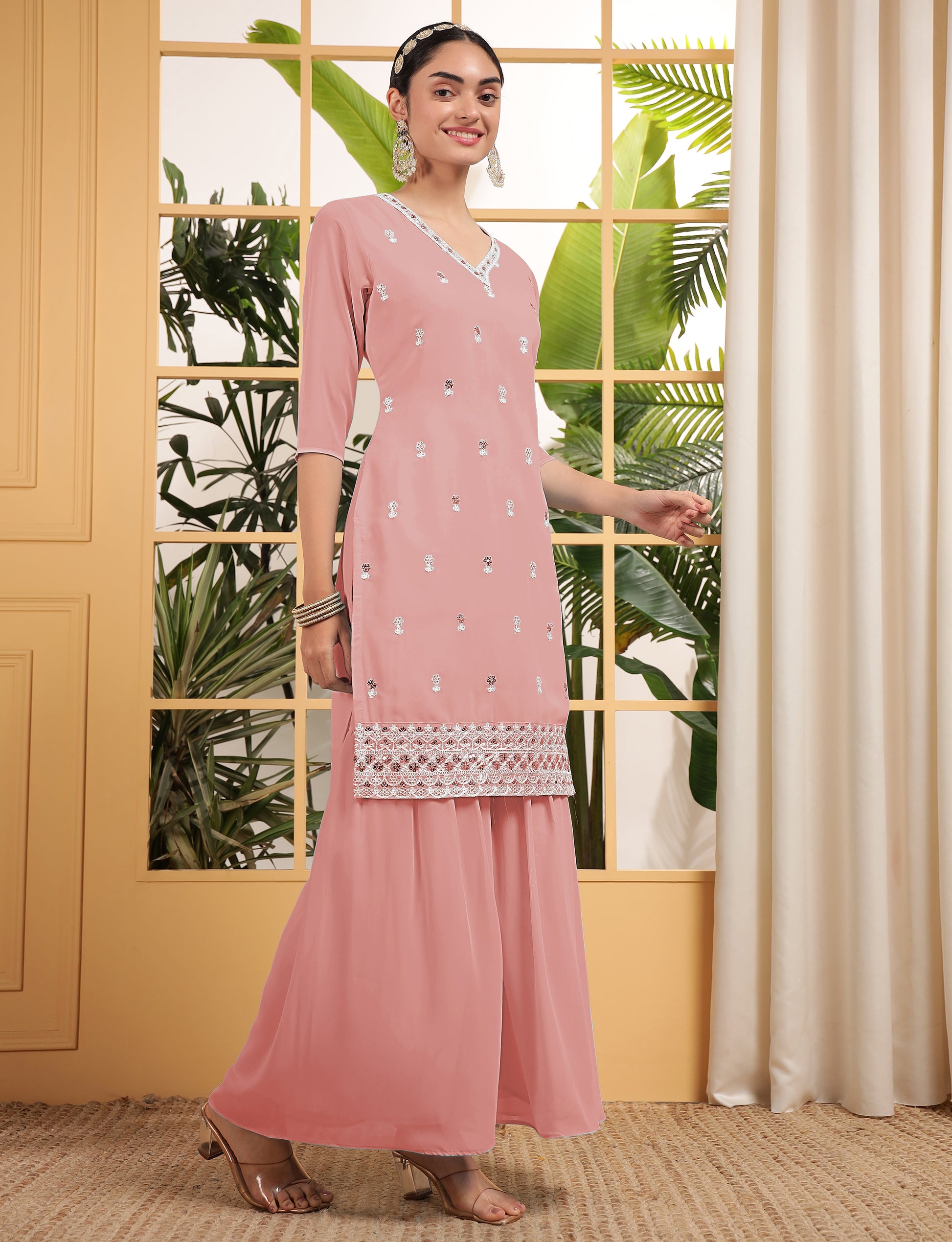 Alluring Peach Sequins Georgette Festive Wear Sharara Suit With Dupatta