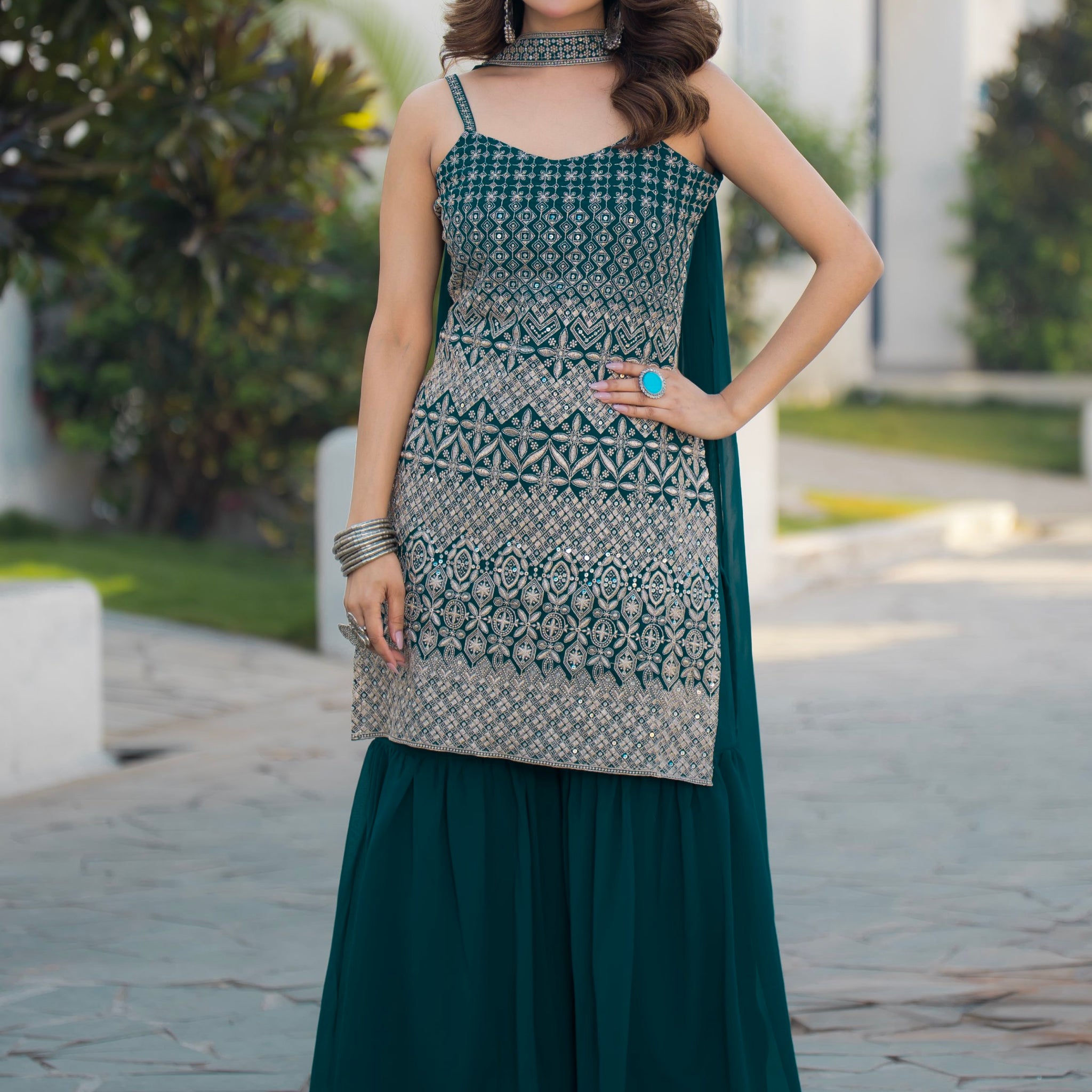 Spectacular Teal Blue Sequins Georgette Festive Wear Sharara Suit With Dupatta