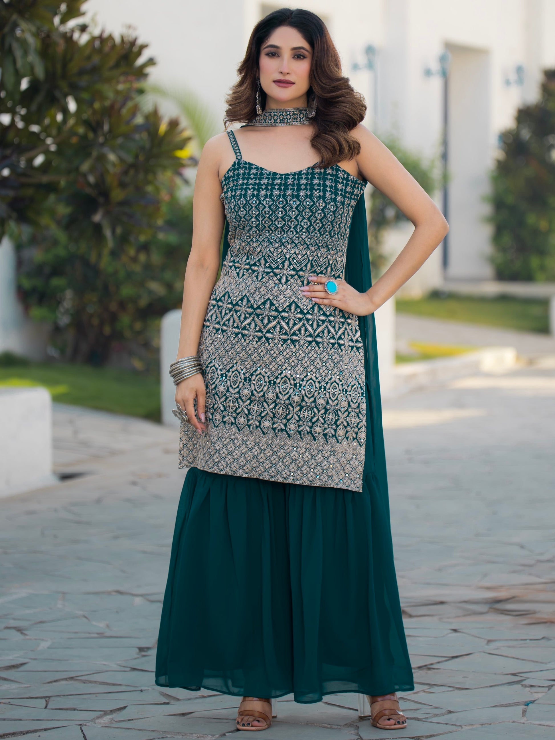 Spectacular Teal Blue Sequins Georgette Festive Wear Sharara Suit With Dupatta