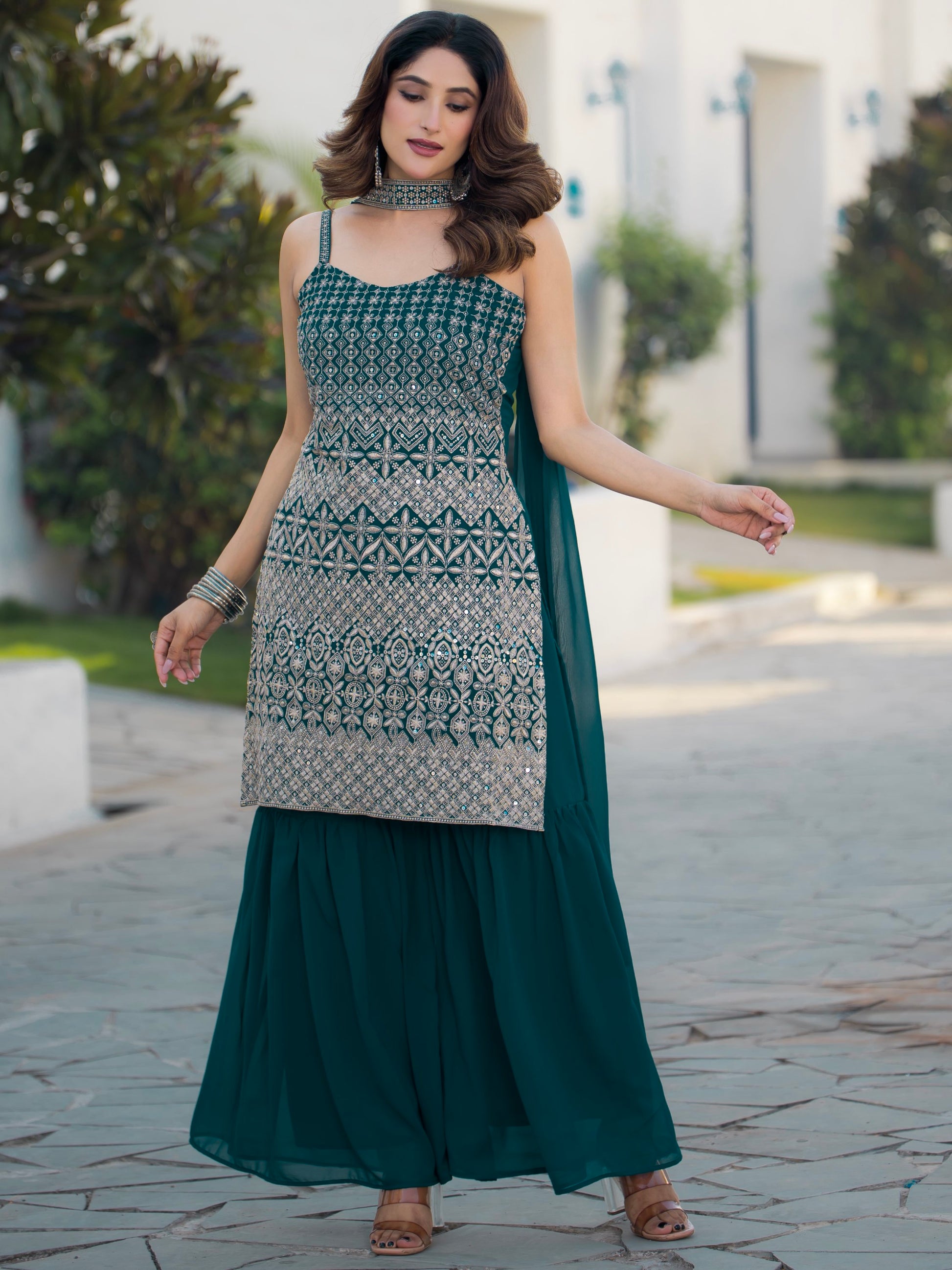 Spectacular Teal Blue Sequins Georgette Festive Wear Sharara Suit With Dupatta