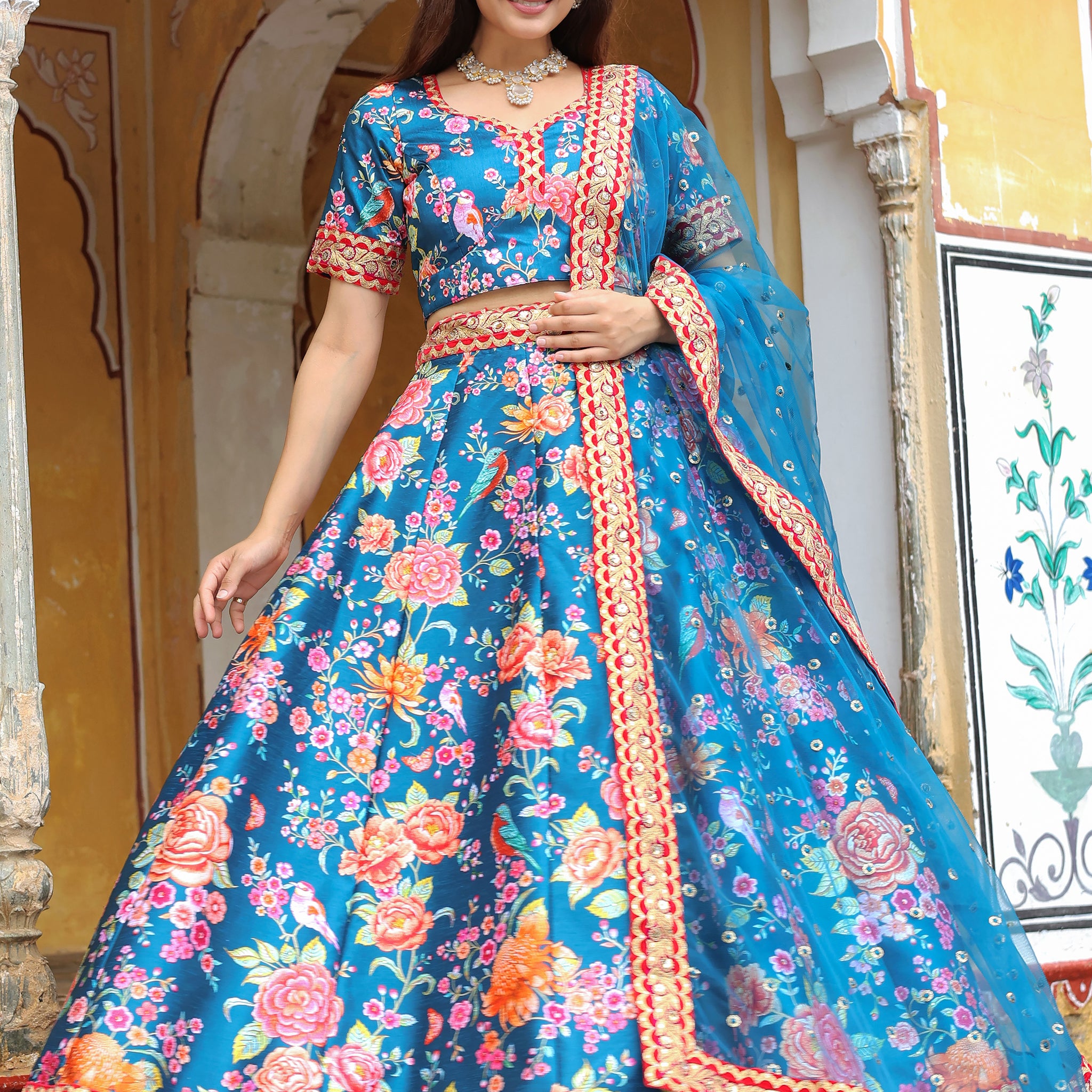 Outstanding Blue Floral Printed Art Silk Wedding Lehenga Choli
