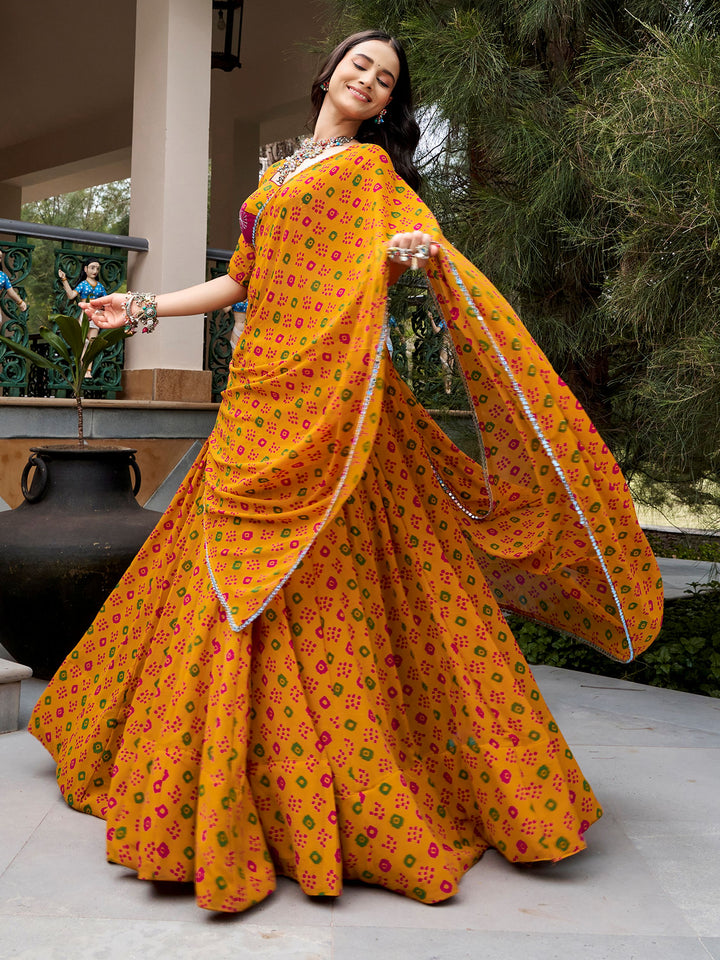 Chic Mustard Yellow Mirror Work Georgette Navratri Wear Lehenga Choli