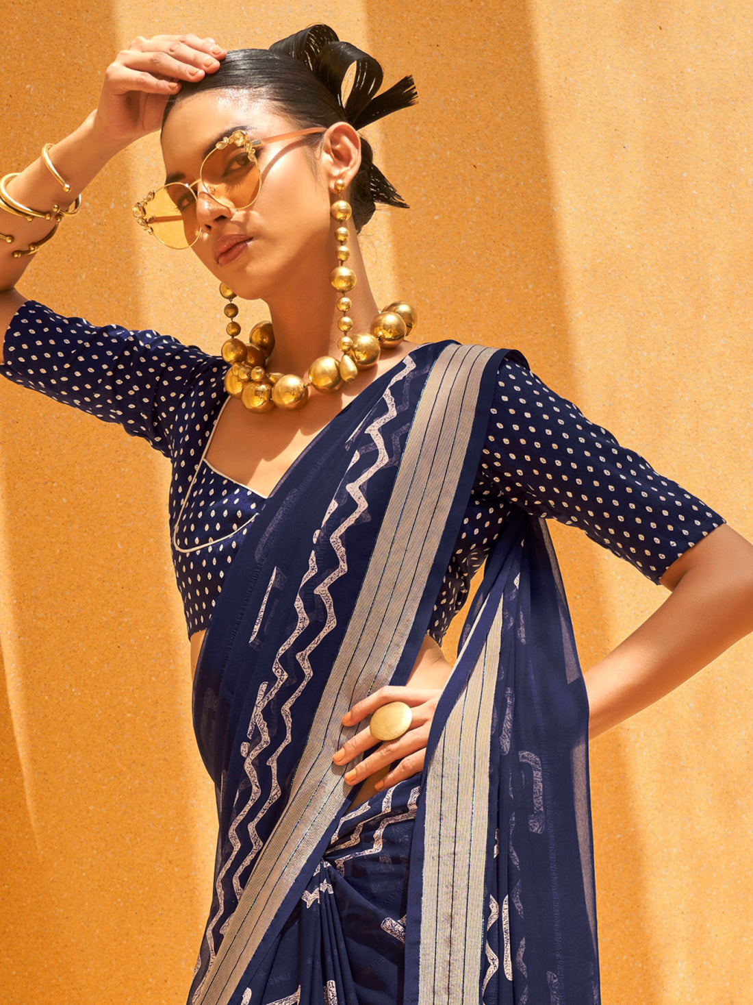 Charming Navy Blue Foil Printed Georgette Event Wear Saree
