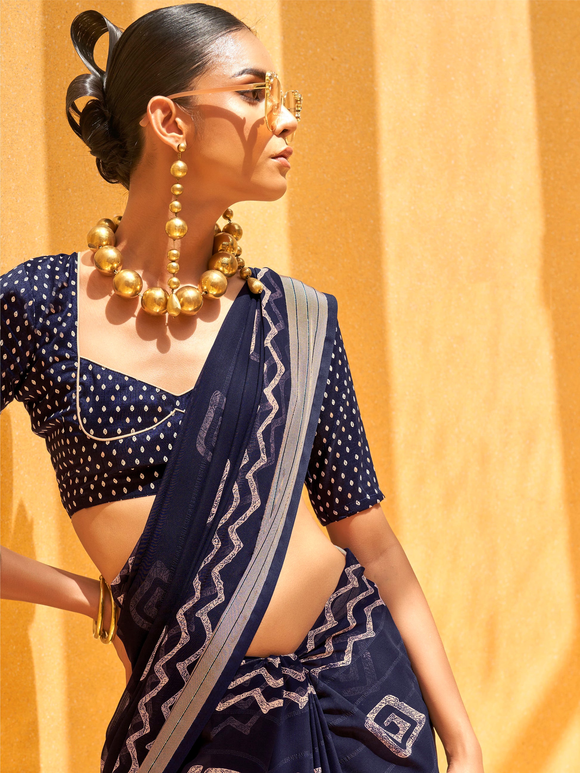 Charming Navy Blue Foil Printed Georgette Event Wear Saree