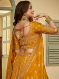 Grand Mustard Yellow Sequins Embroidery Banarasi Silk Haldi Wear Lehenga Choli