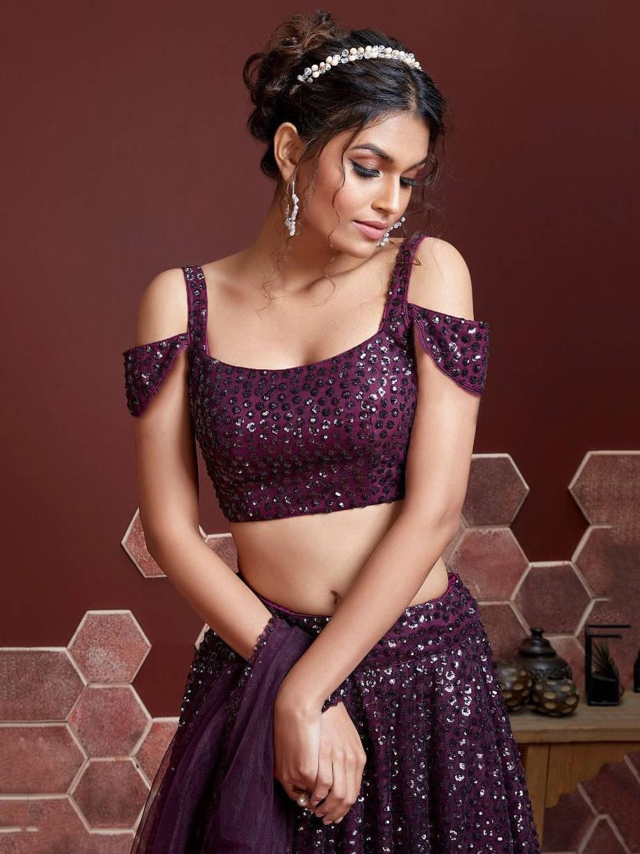 Elegant Purple Sequins Embroidered Net Party Wear Lehenga Choli