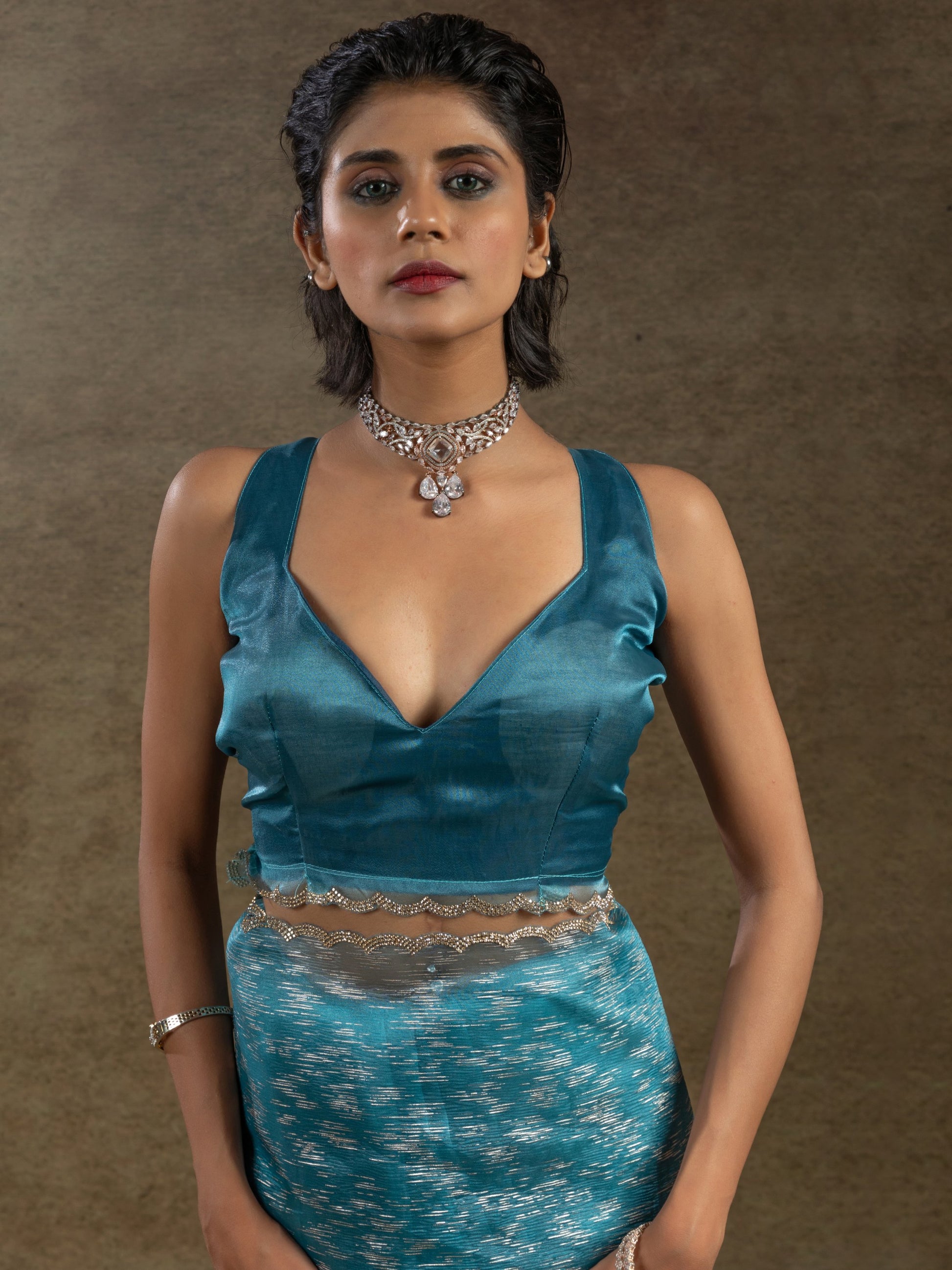 Charming Teal Blue Zari Weaving Organza Reception Wear Pre-Stitched Saree