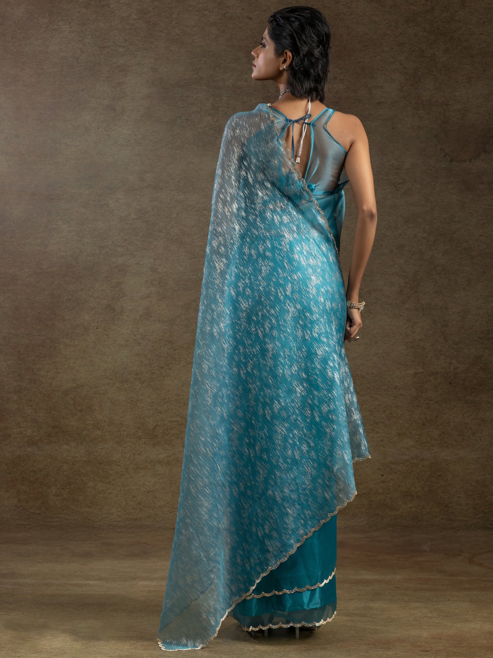 Charming Teal Blue Zari Weaving Organza Reception Wear Pre-Stitched Saree