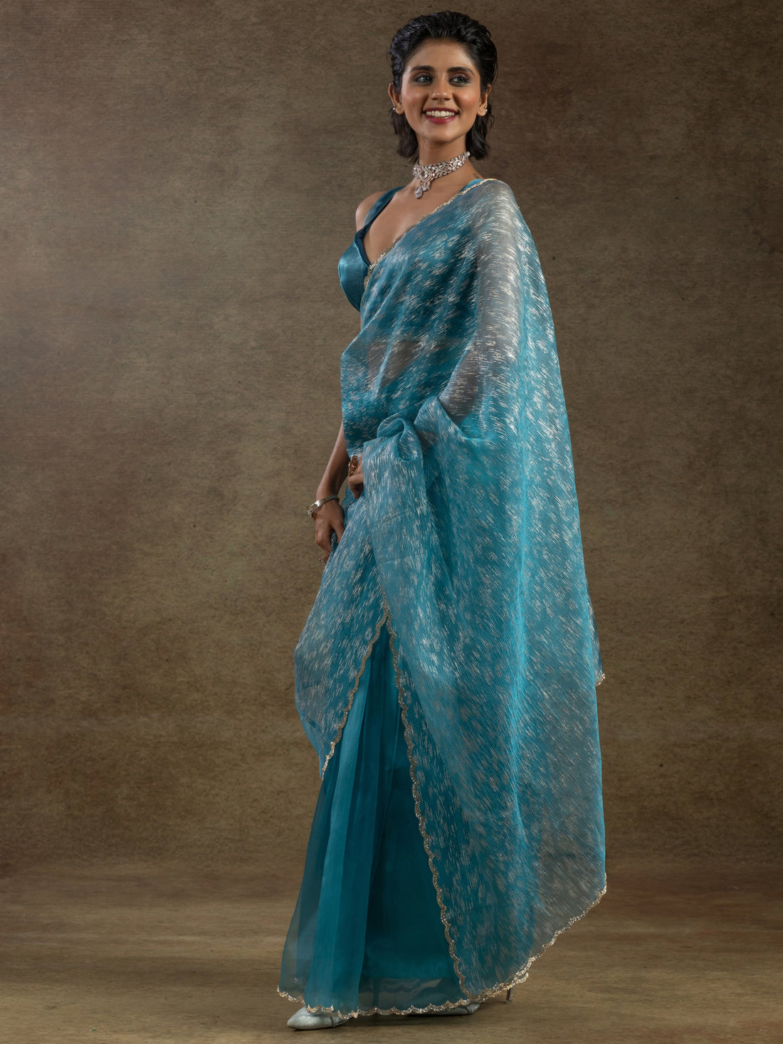 Charming Teal Blue Zari Weaving Organza Reception Wear Pre-Stitched Saree