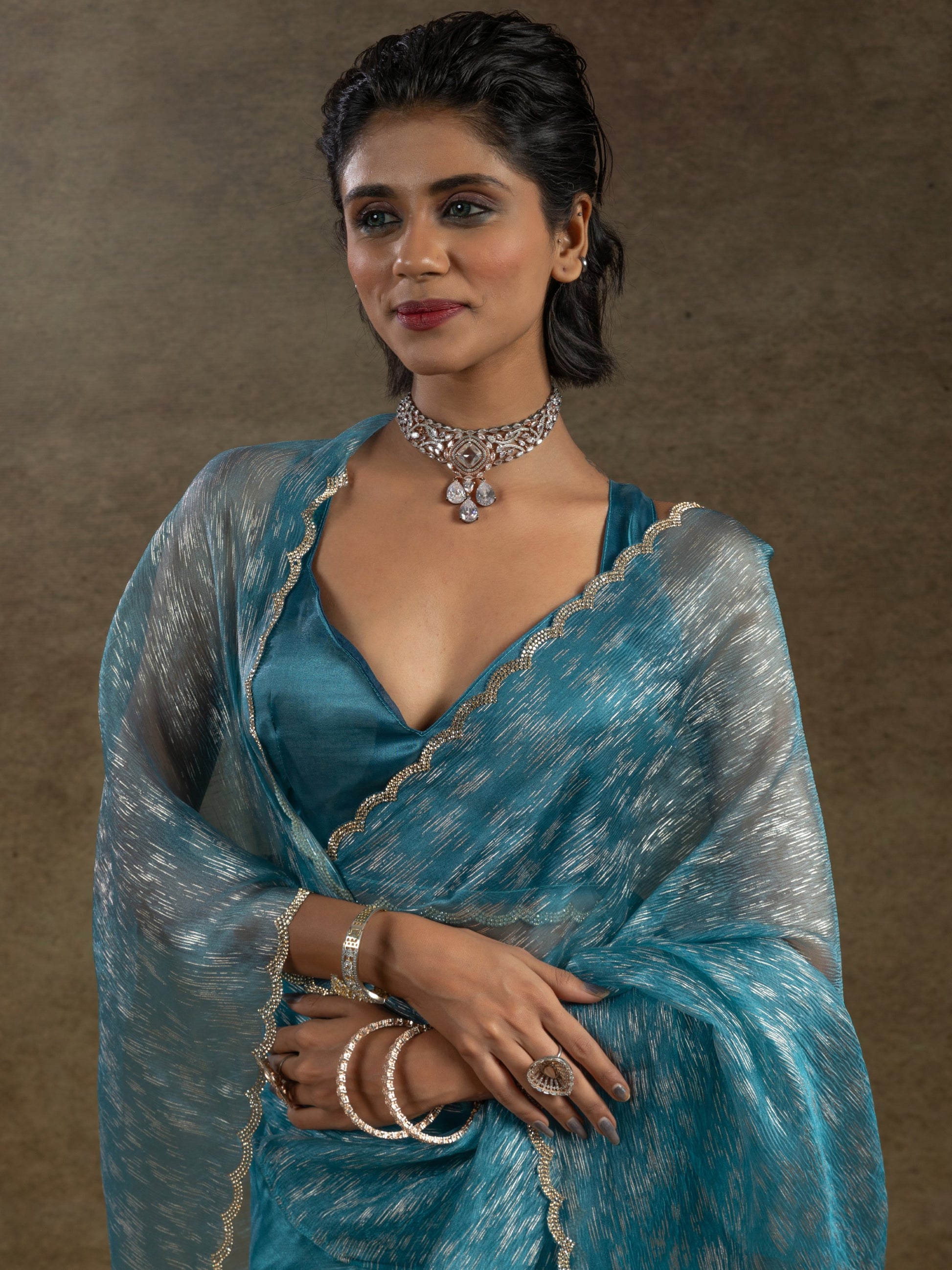 Charming Teal Blue Zari Weaving Organza Reception Wear Pre-Stitched Saree
