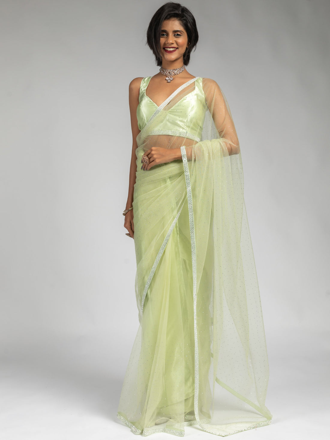 Tantalizing Pista Green Diamond Bordered Net Party Wear Pre-Stitched Saree