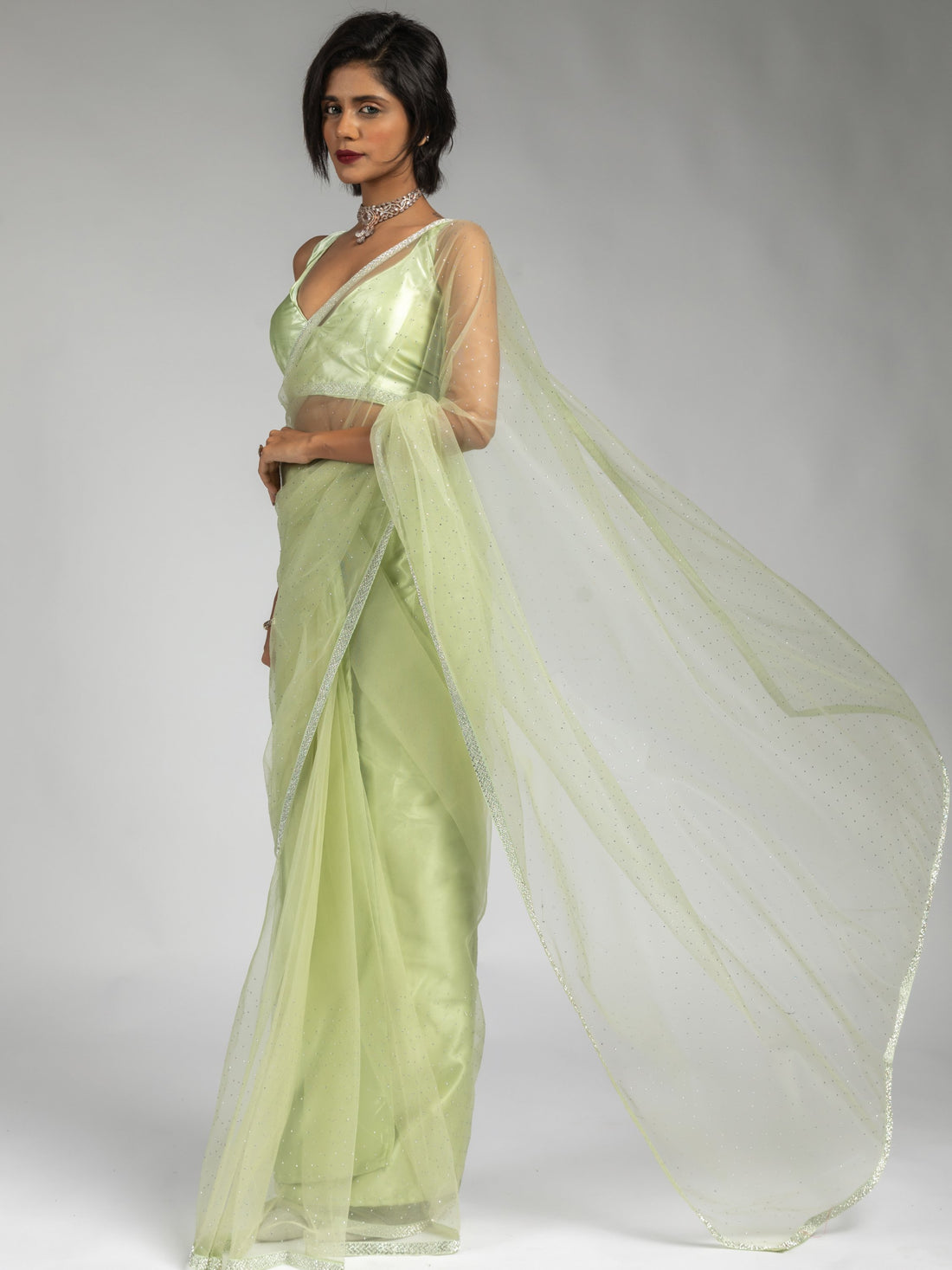 Tantalizing Pista Green Diamond Bordered Net Party Wear Pre-Stitched Saree