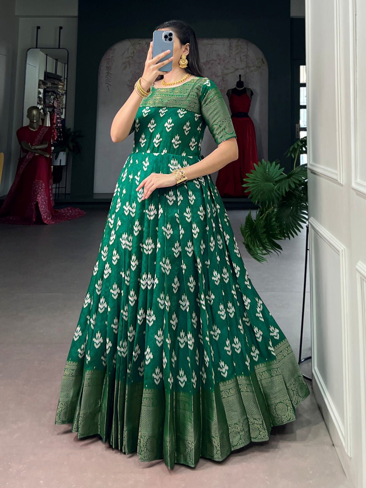 Enchanting Green Zari Woven Cotton Festive Wear Gown