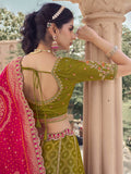 Superb Olive Green Zari Weaving Tissue Function Wear Lehenga Choli With Dupatta