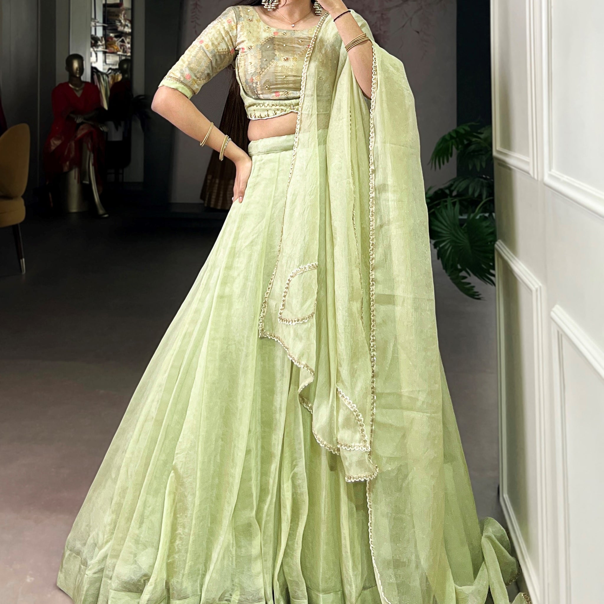 Elegant Tea Green Crush Silk Mehendi Wear Lehenga With Bead Work Choli