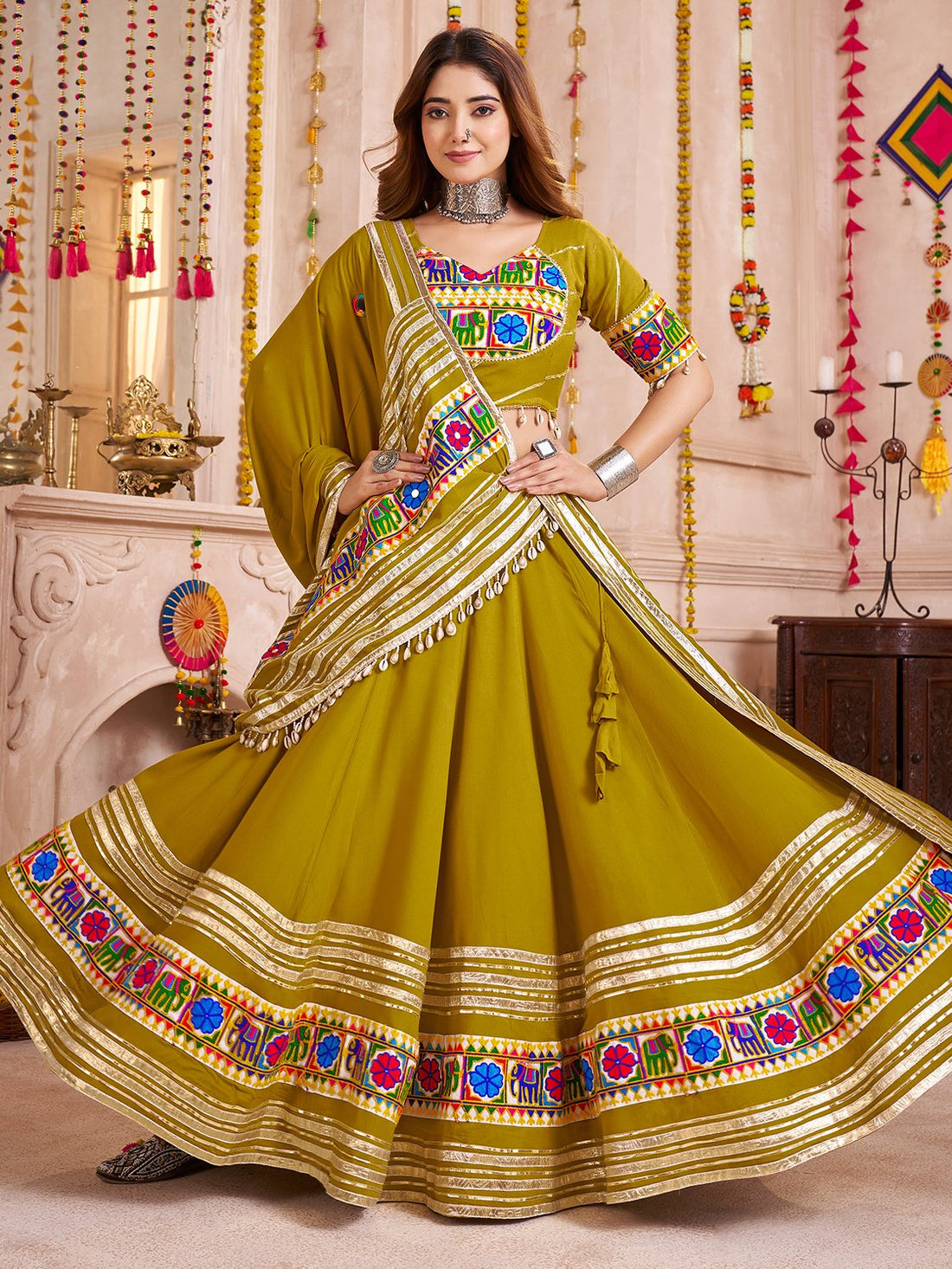 Wonderful Olive Green Lace Work Cotton Navratri Wear Lehenga With Blouse