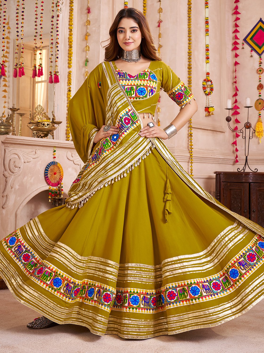 Wonderful Olive Green Lace Work Cotton Navratri Wear Lehenga With Blouse