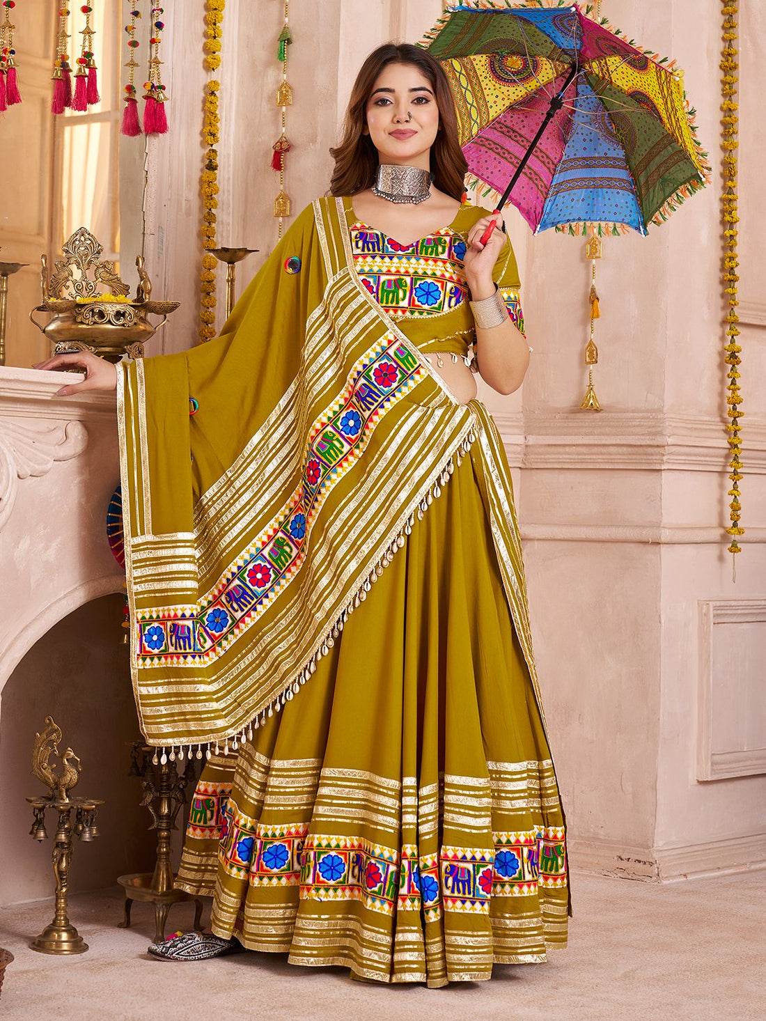 Wonderful Olive Green Lace Work Cotton Navratri Wear Lehenga With Blouse
