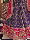 Classy Purple Zari Weaving Tissue Engagement Wear Lehenga With Blouse