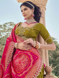Superb Olive Green Zari Weaving Tissue Function Wear Lehenga Choli With Dupatta