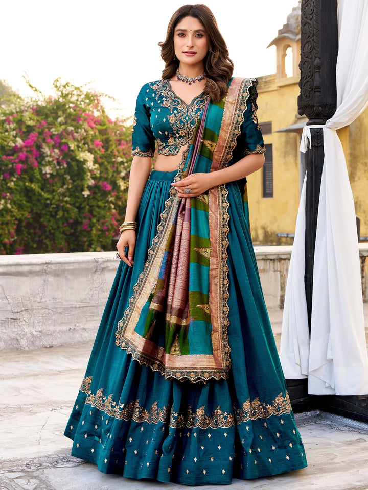 Elegant Teal Blue Sequins Silk Engagement Wear Lehenga Choli With Dupatta