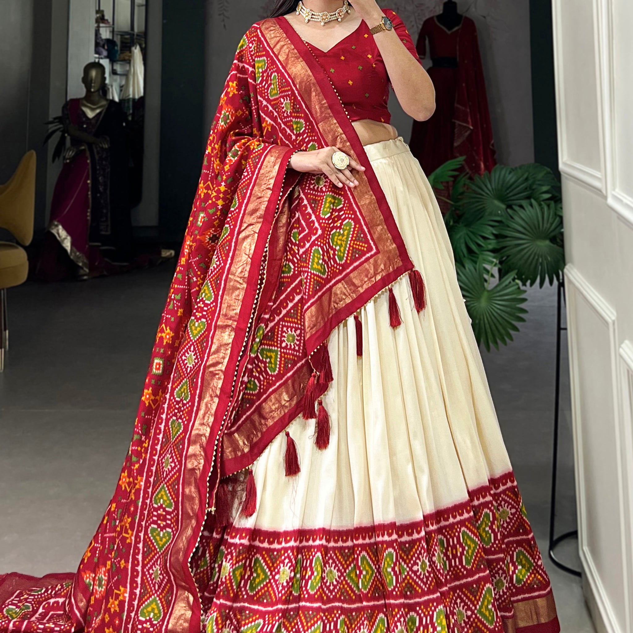 Dazzling Red Patola Printed Tussar Silk Festival Wear Lehenga Choli
