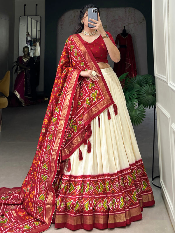 Dazzling Red Patola Printed Tussar Silk Festival Wear Lehenga Choli