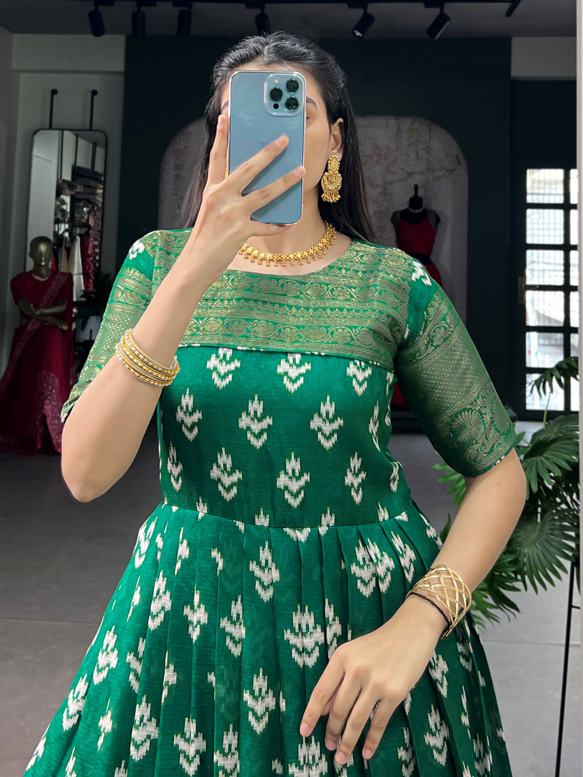 Enchanting Green Zari Woven Cotton Festive Wear Gown