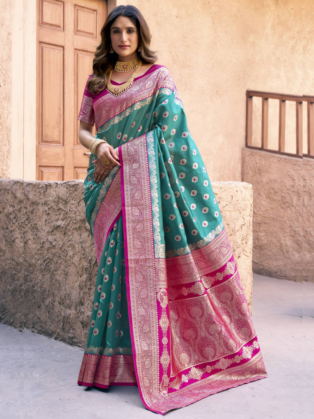 Marvelous Teal Green Zari Weaving Silk Saree With Pink Blouse