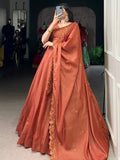 Lovable Orange Thread Embroidered Tussar Silk Lehenga With Blouse