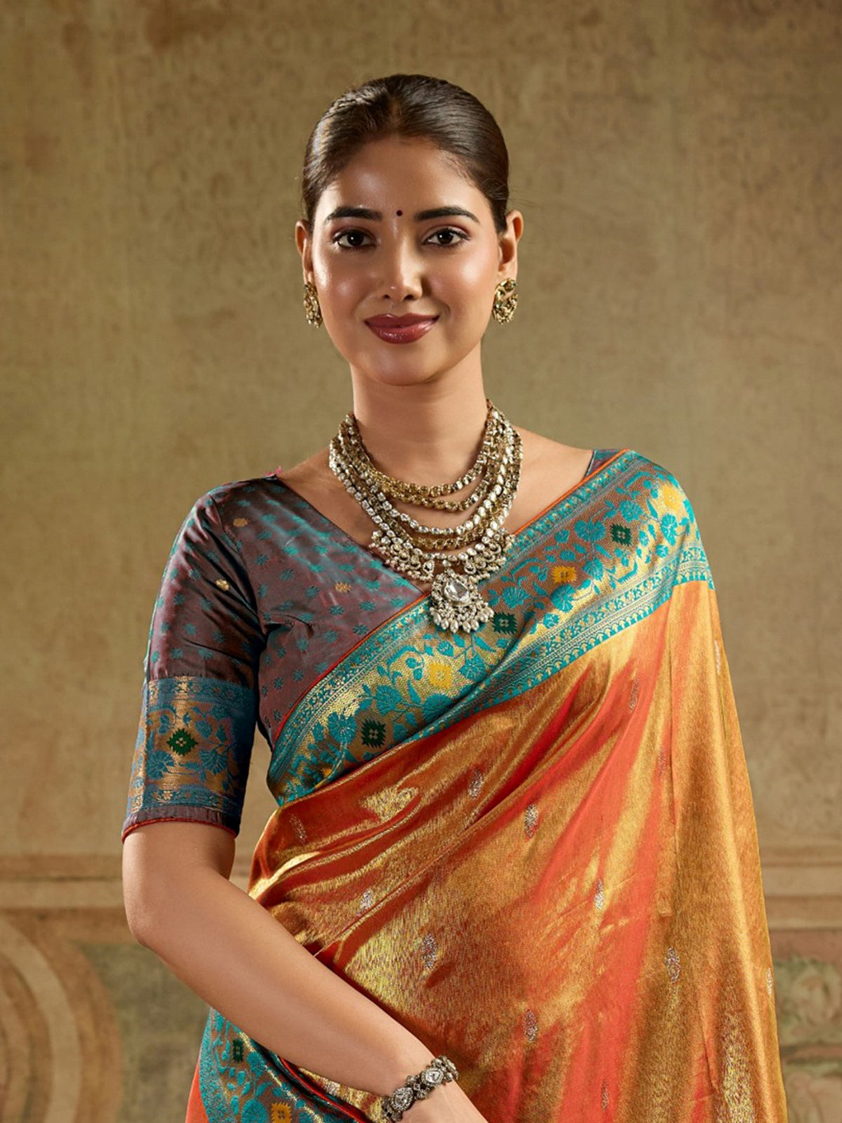 Fascinating Orange Zari Woven Tissue Silk Wedding Wear Saree
